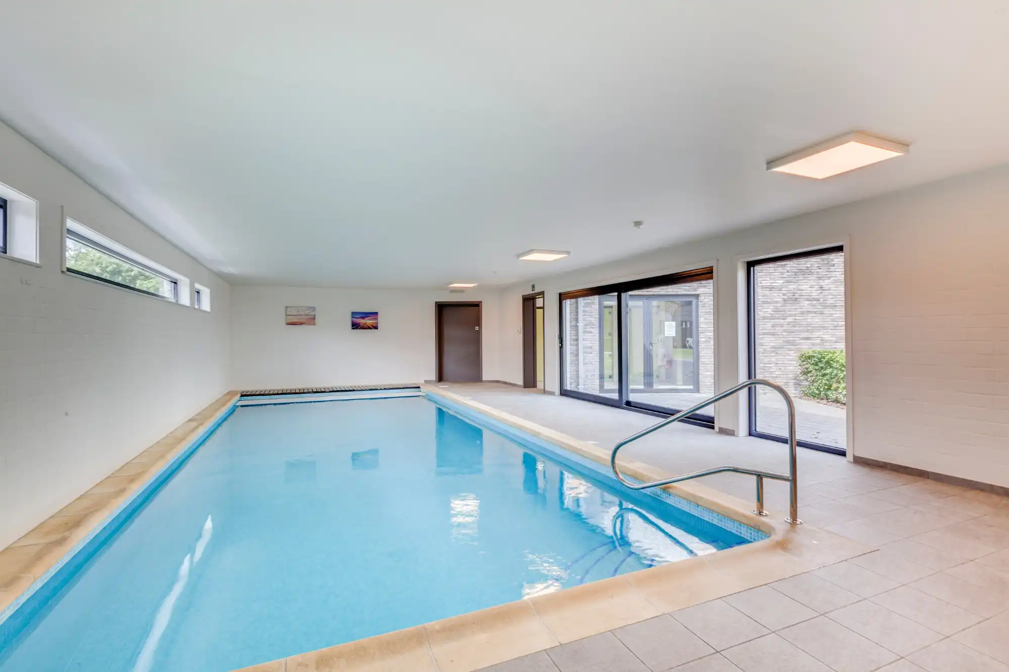 Geniet van zorgeloos comfort in deze gelijkvloerse assistentiewoning met autostaanplaats foto 14