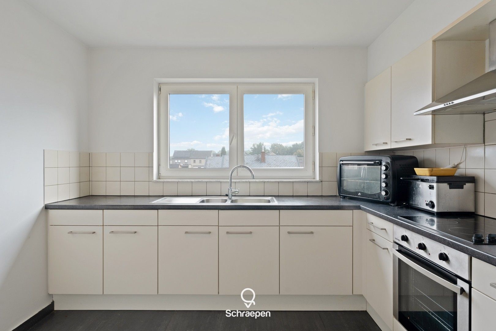 Instapklaar appartement met 2 slpks en garage op wandelafstand van centrum-Zonhoven! foto 12