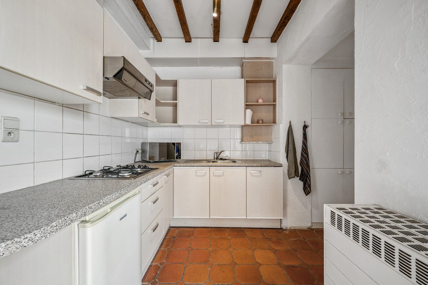 Opbrengsteigendom met 2 appartementen en een handelspand in het hart van Tienen foto 15