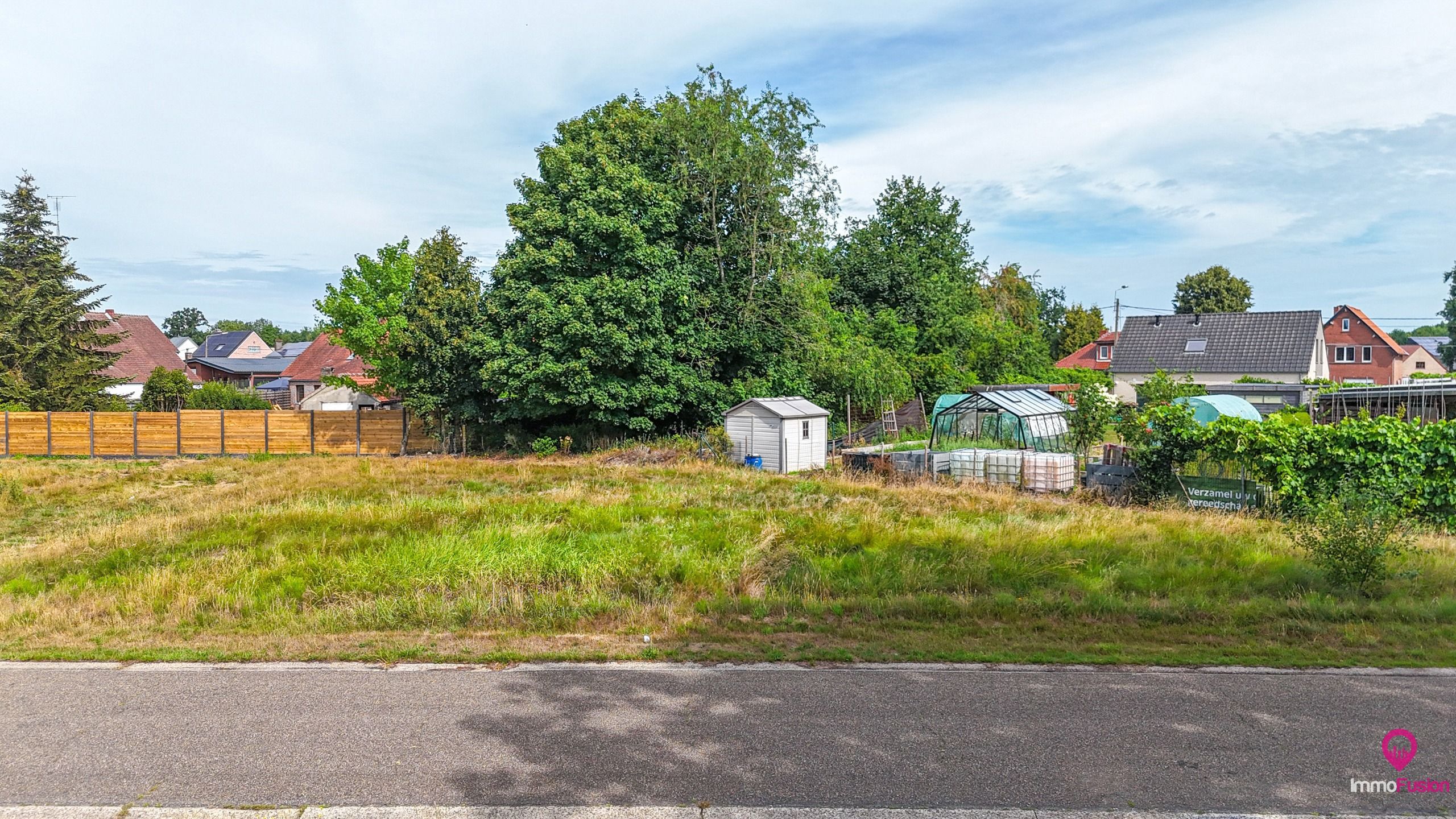 Perceel met uitzonderlijke breedte (40m) in groene omgeving! foto 3