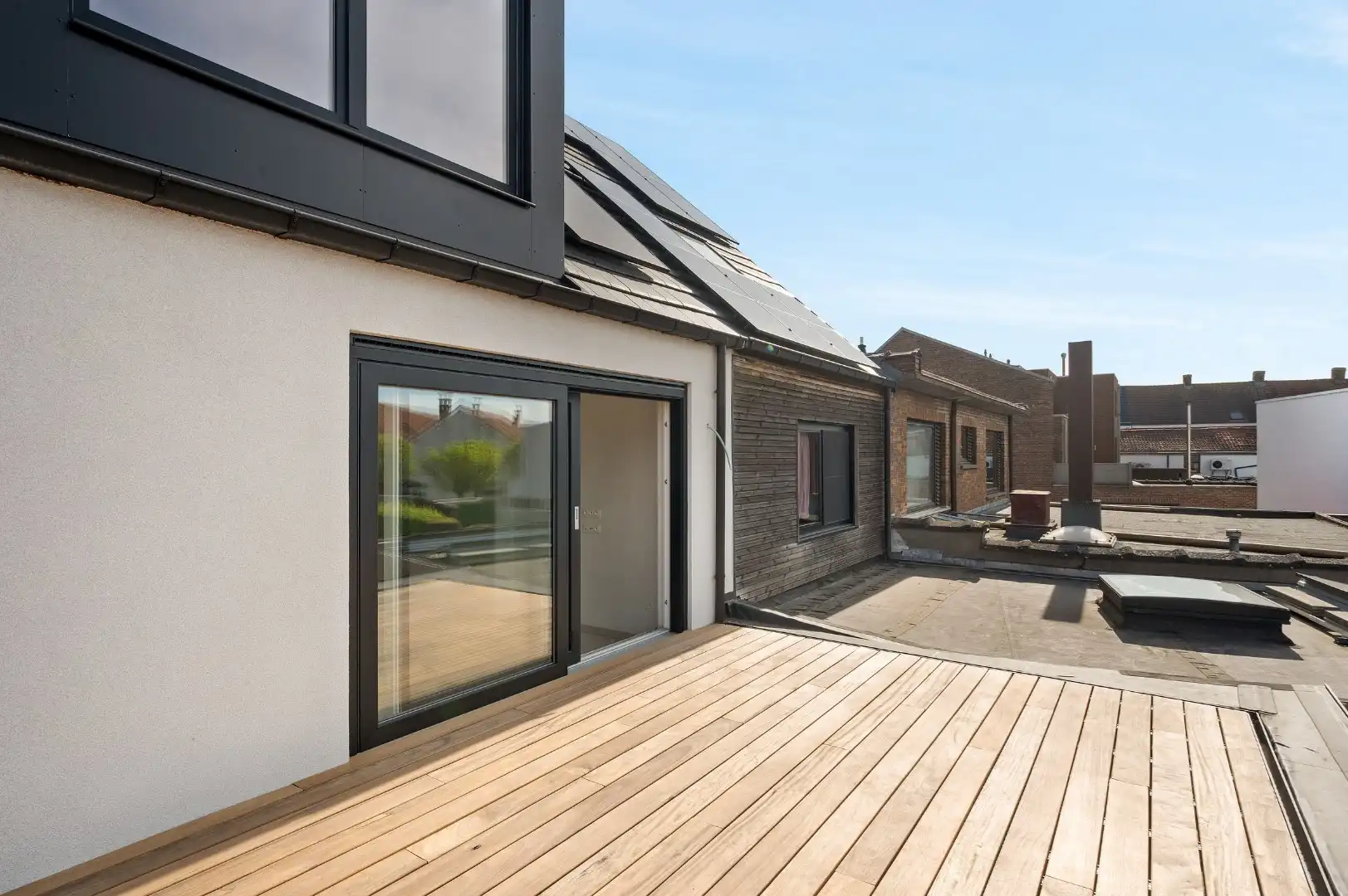 DUPLEX NIEUWBOUWAPPARTEMENT MET 2 SLPKS EN RUIM TERRAS TE GELUWE foto 6