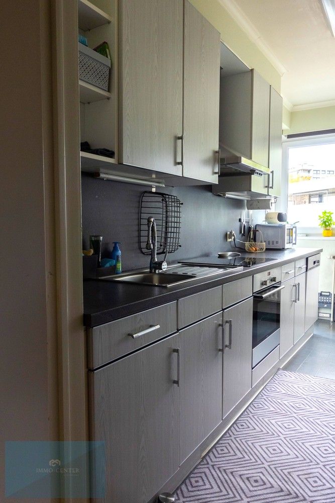 Instapklaar 2-slaapkamerappartement met terras op topligging in Genk foto 11