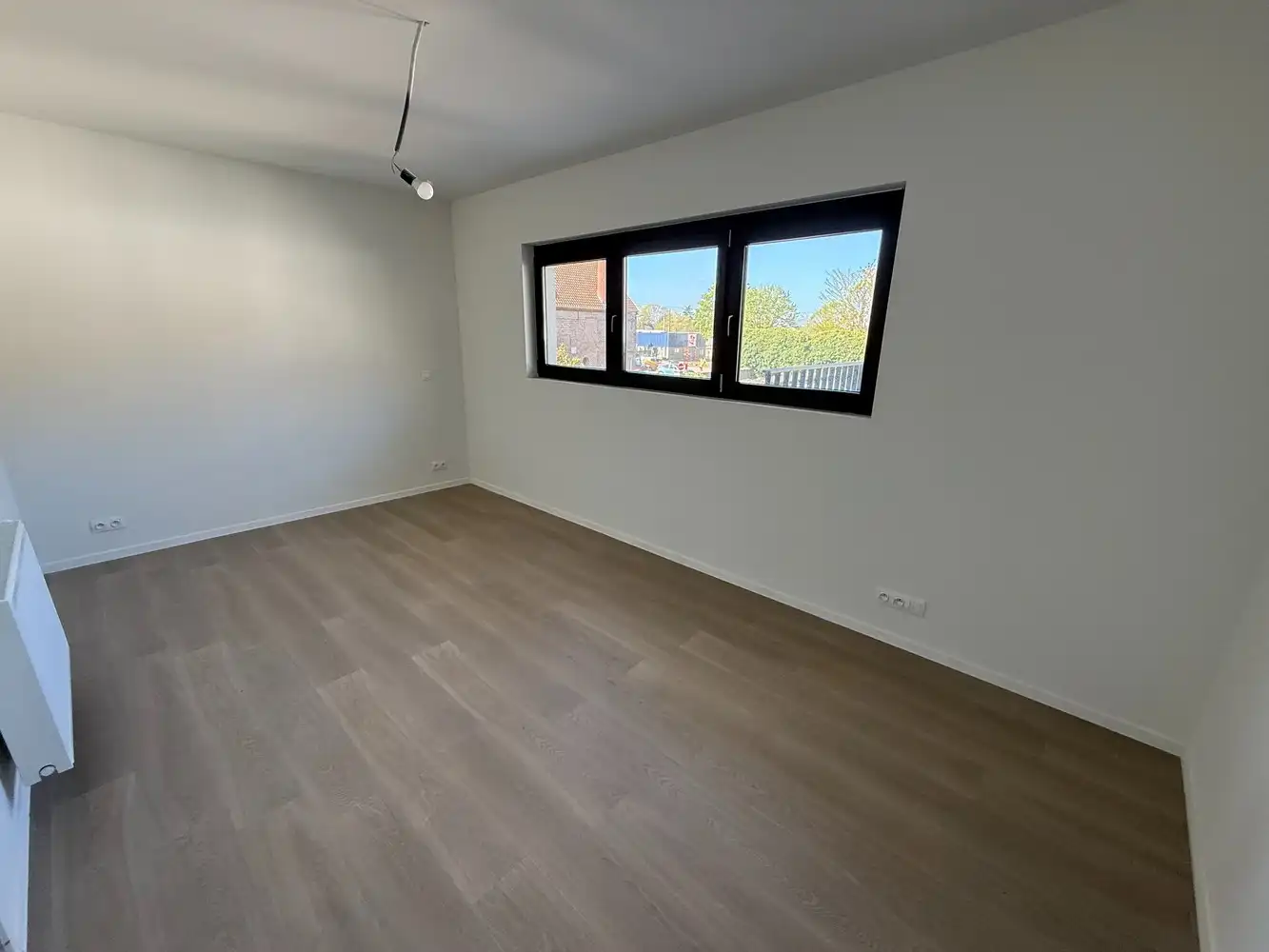 Ruim nieuwbouwappartement met 2 slaapkamers én parkeerplaats! foto 8