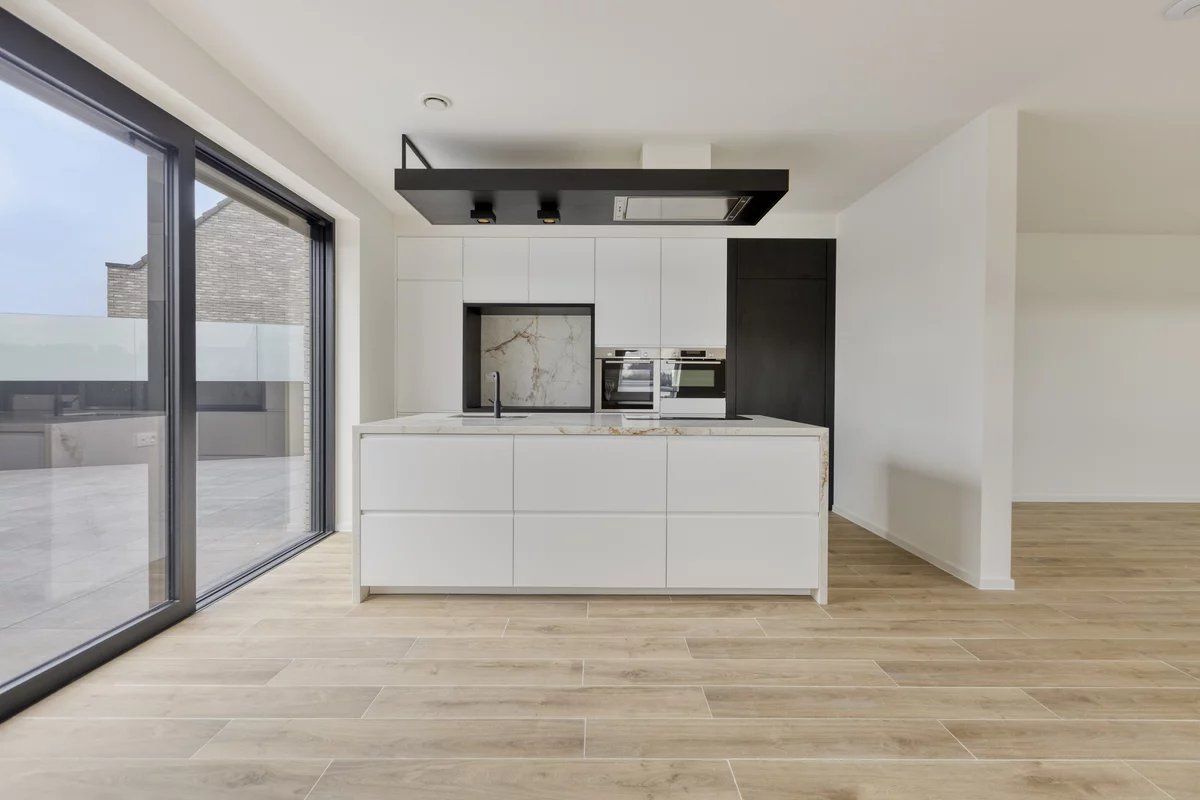 EXCLUSIEF EN KWALITATIEF NIEUWBOUWAPPARTEMENT VAN 163 M² MET 3 SLPK'S, 2 BADK'S EN RIANTE TERRASSEN IN MUNSTERBILZEN foto 8