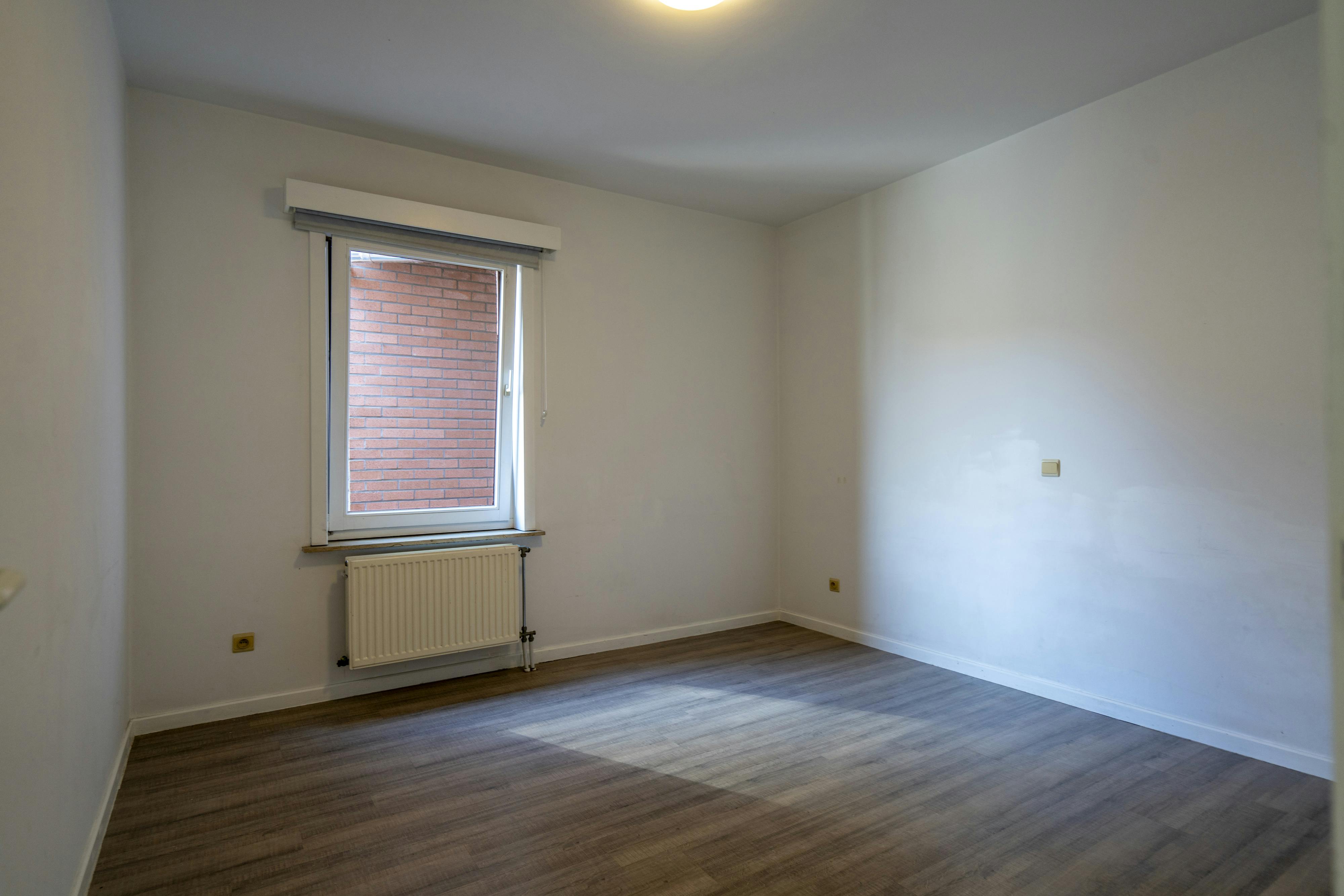 Ruim 3-slaapkamer-appartement met centrale ligging te koop in Kortrijk foto 12