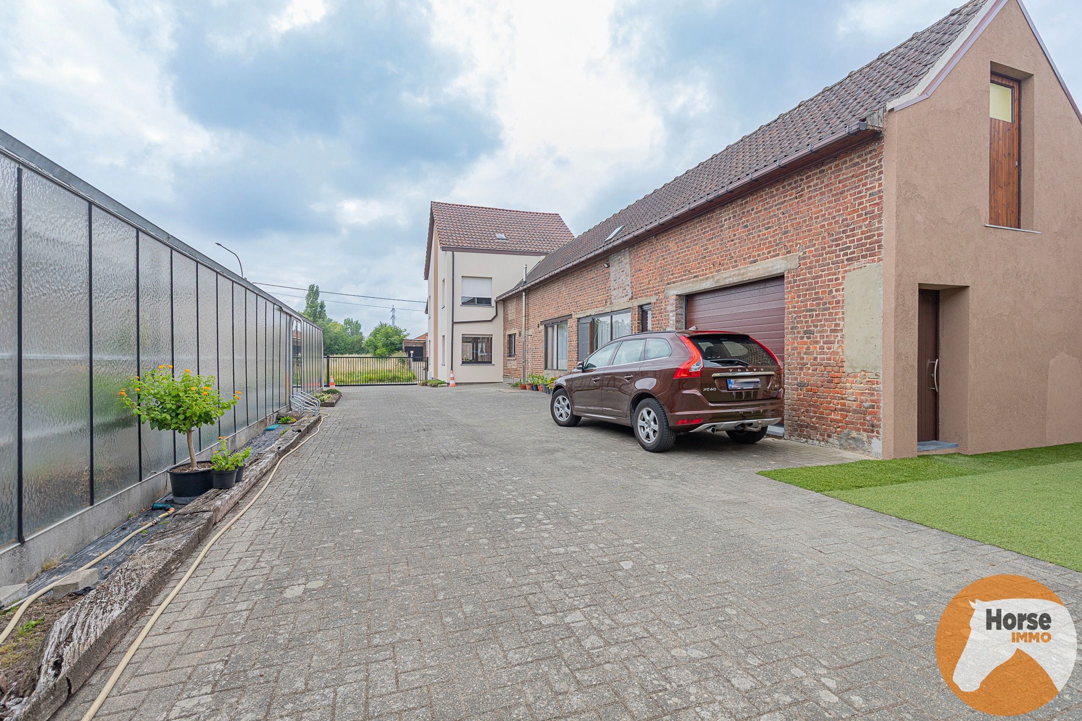 ERPE-MERE - Goed onderhouden woning met magazijn en serres foto 34