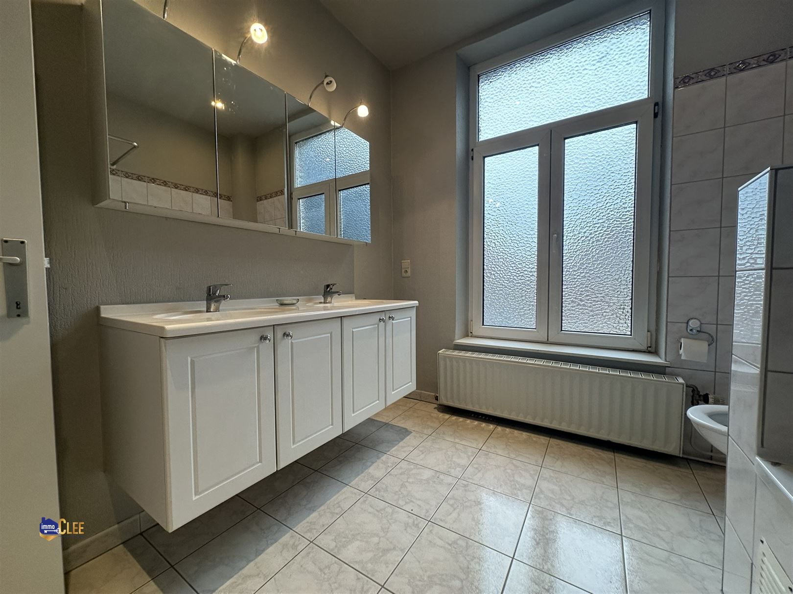 Ruime stadswoning met 3 slpks en koer foto 12