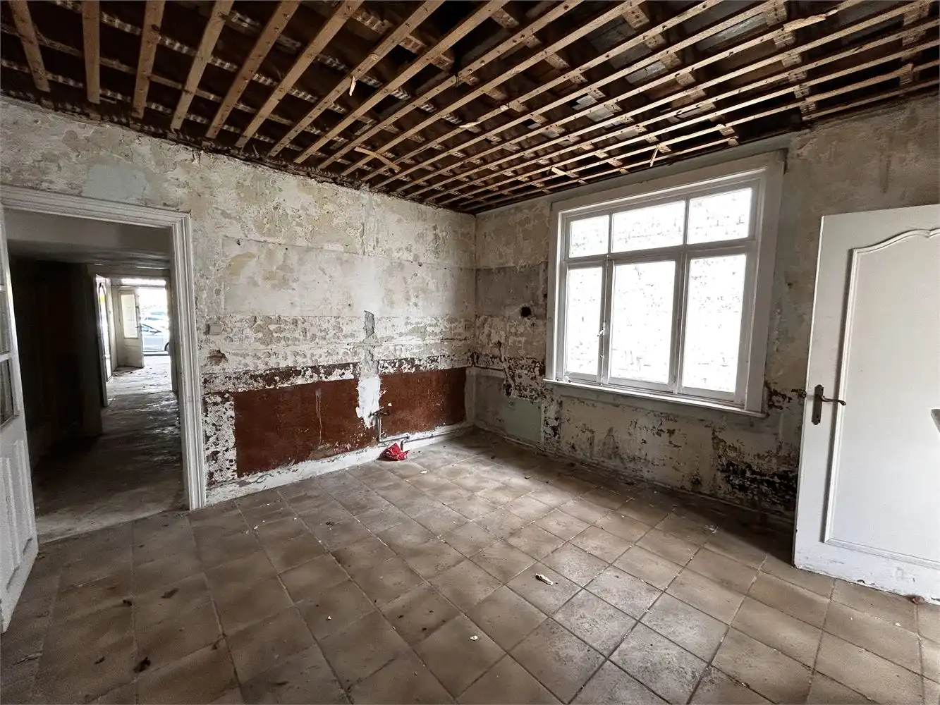 Te renoveren handelshuis met woonst foto 16