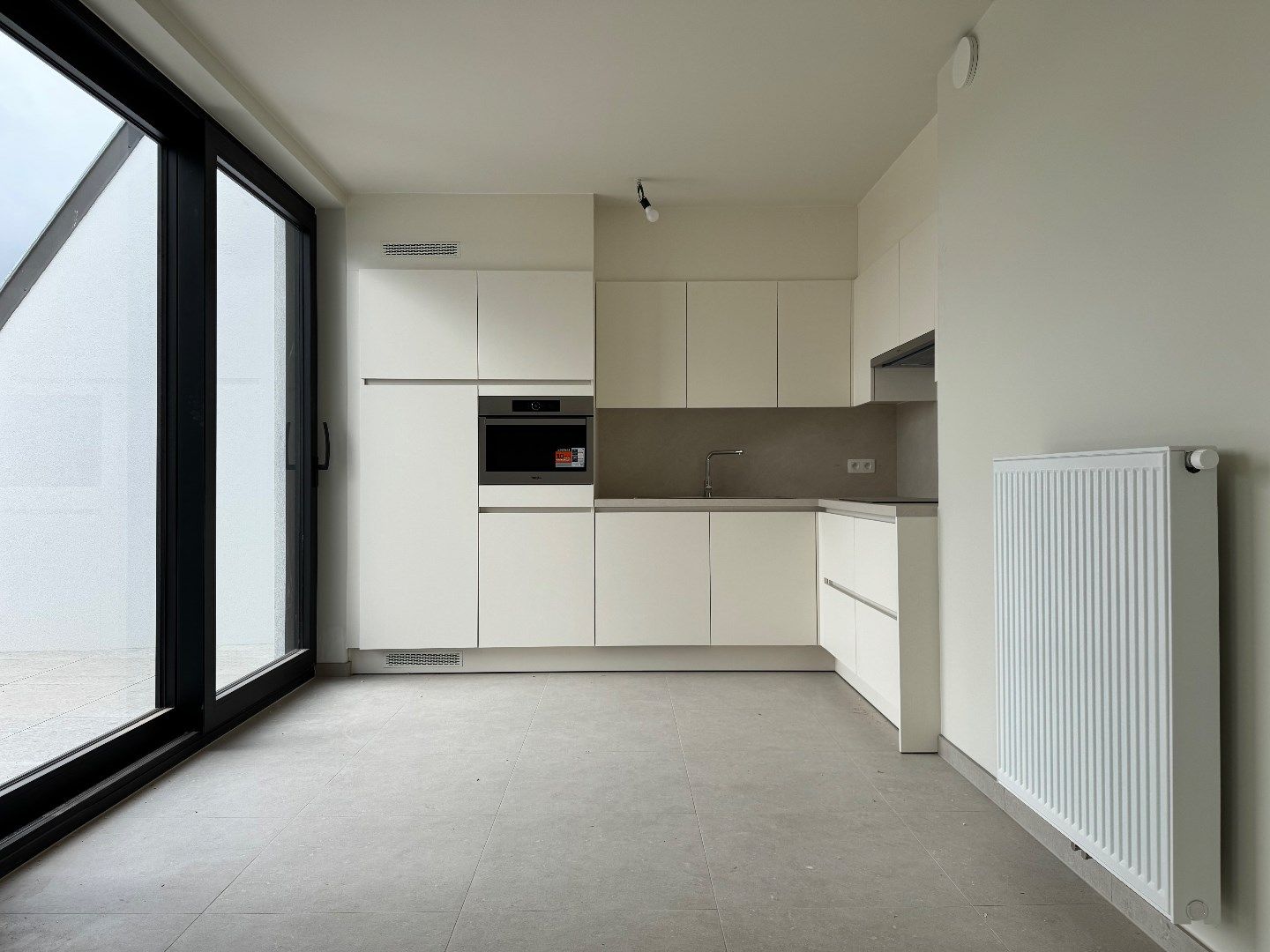 Uniek nieuwbouw appartement met 2 slaapkamers en veel zonlicht te Eernegem foto 4