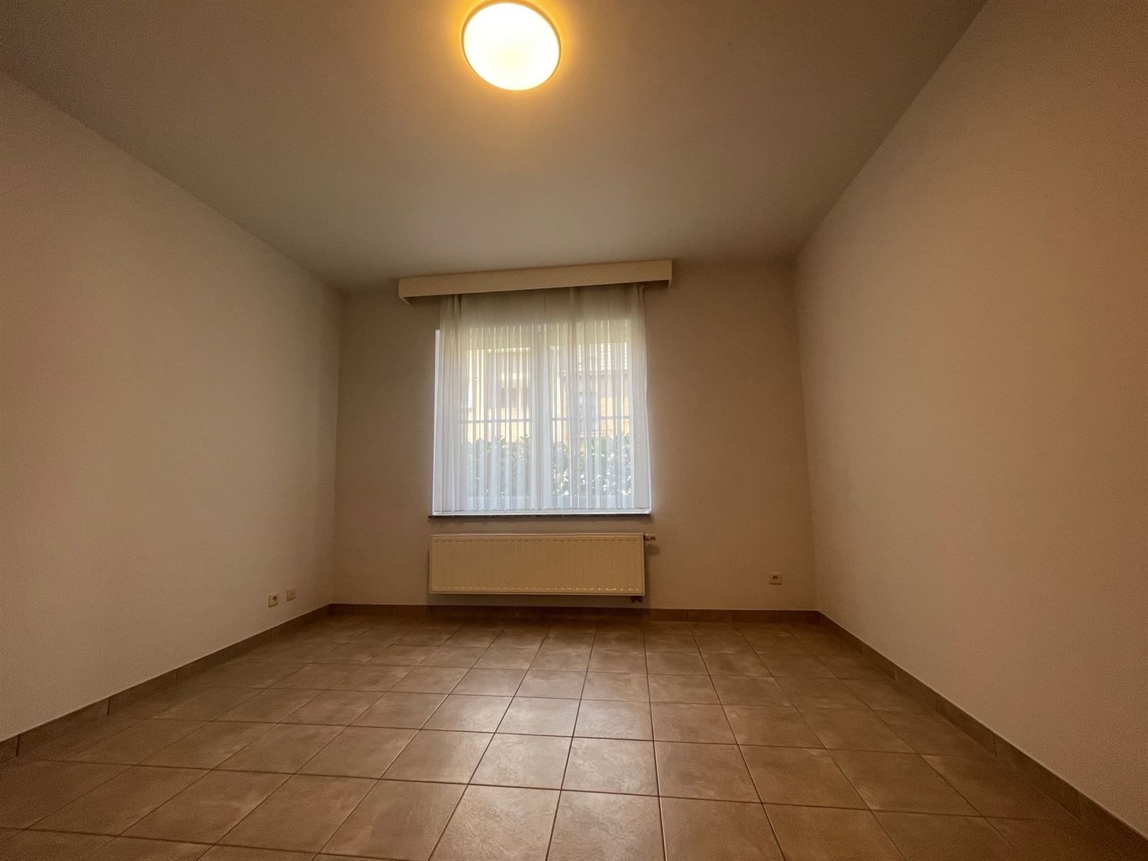 Gelijkvloerse appartement  met afgesloten koer  foto 11