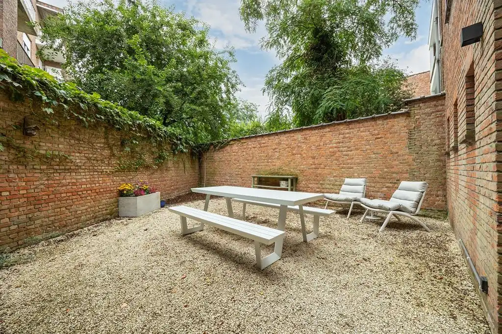Instapklaar appartement met ruime tuin foto 11