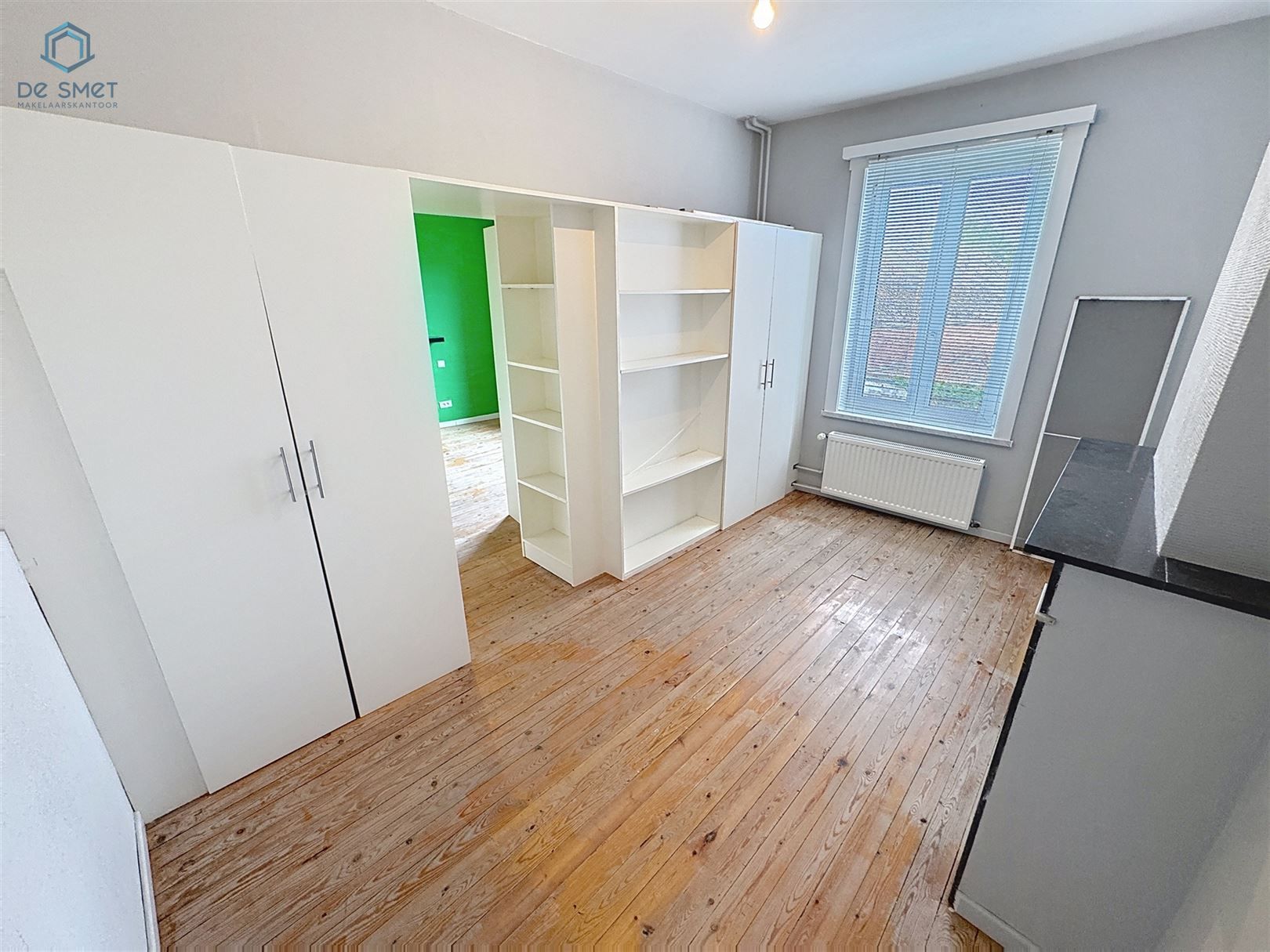 Instapklaar herenhuis met 3 slaapkamers, garage en royaal terras in het hart van Meerbeke foto 18