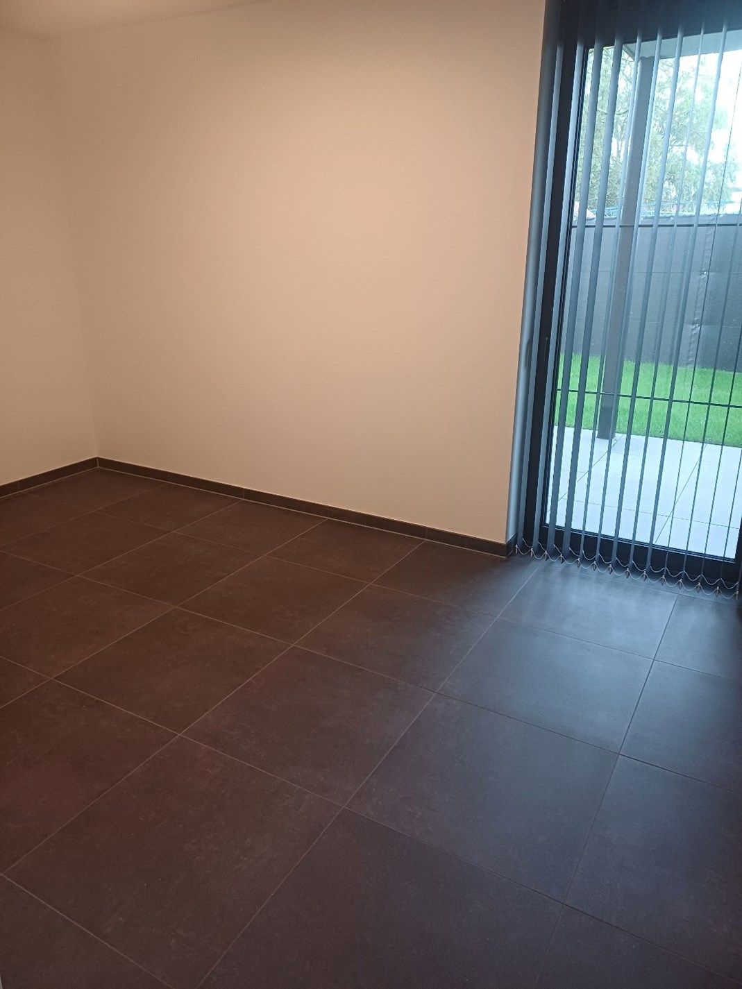 Instapklaar gelijkvloers appartement in Peer centrum met ruim terras + tuintje. foto 16