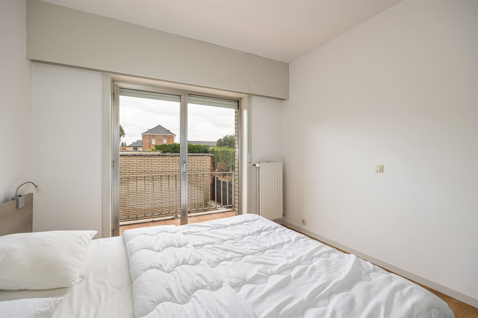 Opbrengsteigendom met 5 appartementen en garages foto 19
