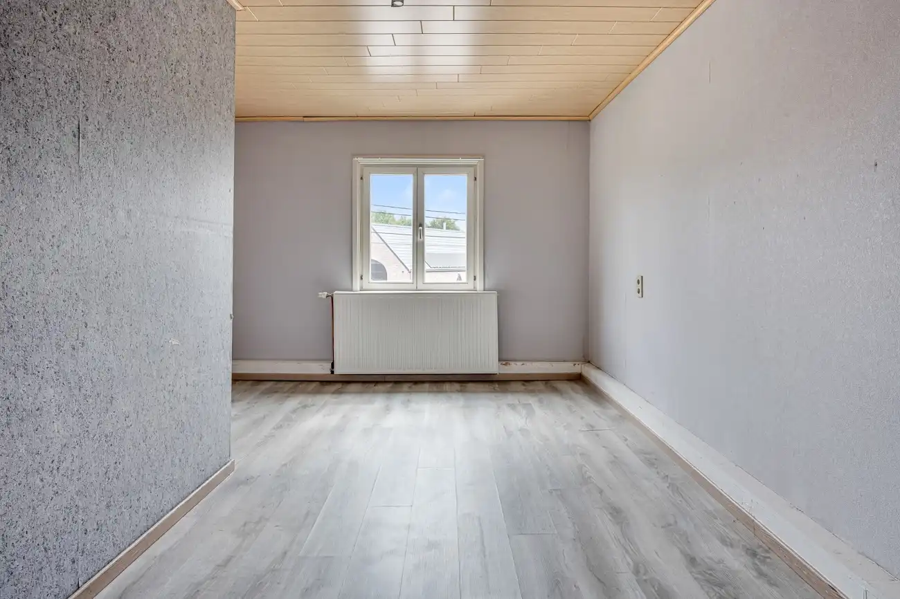 Ideale halfopen starterswoning (met twee autostaanplaatsen vóór de woning) op wandelafstand van het centrum van het vernieuwde Zeveneken! foto 13
