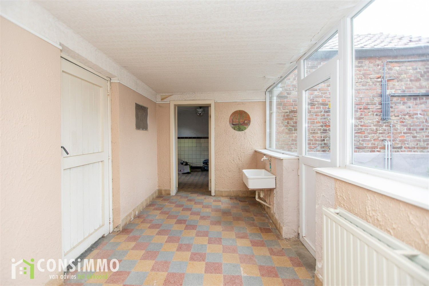 Te renoveren gezinswoning met loods en kantoorruimte op zichtlocatie in Sint-Truiden foto 18