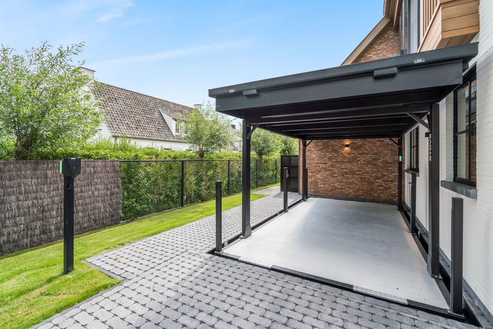 Alleenstaande nieuwbouw villa gelegen op perfect georiënteerd terrein in een residentiële villawijk aan de rand van het Zoute foto 32