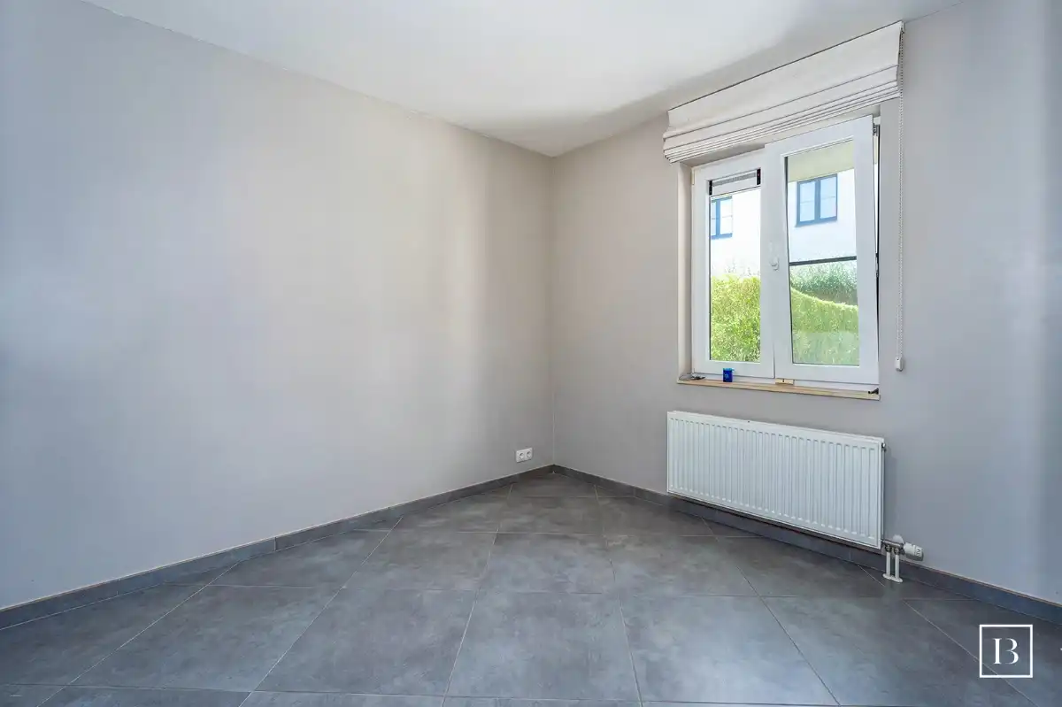Lichtrijk tuinappartement met 1 slaapkamer foto 6