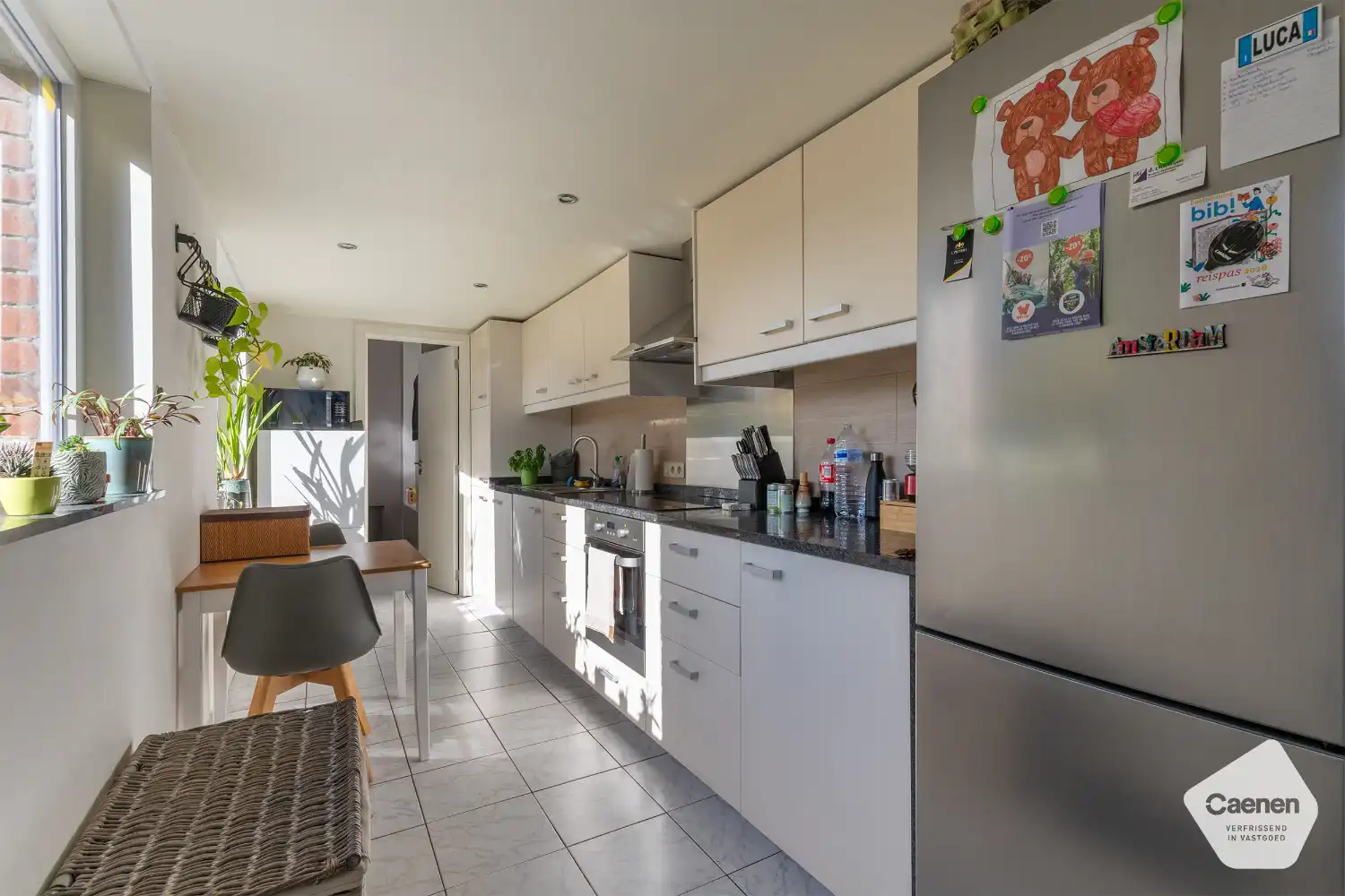 Instapklare half-open woning in het rustige en groene dorp Hertsberge met 3 slaapkamers , carport en zonnige tuin! foto 6