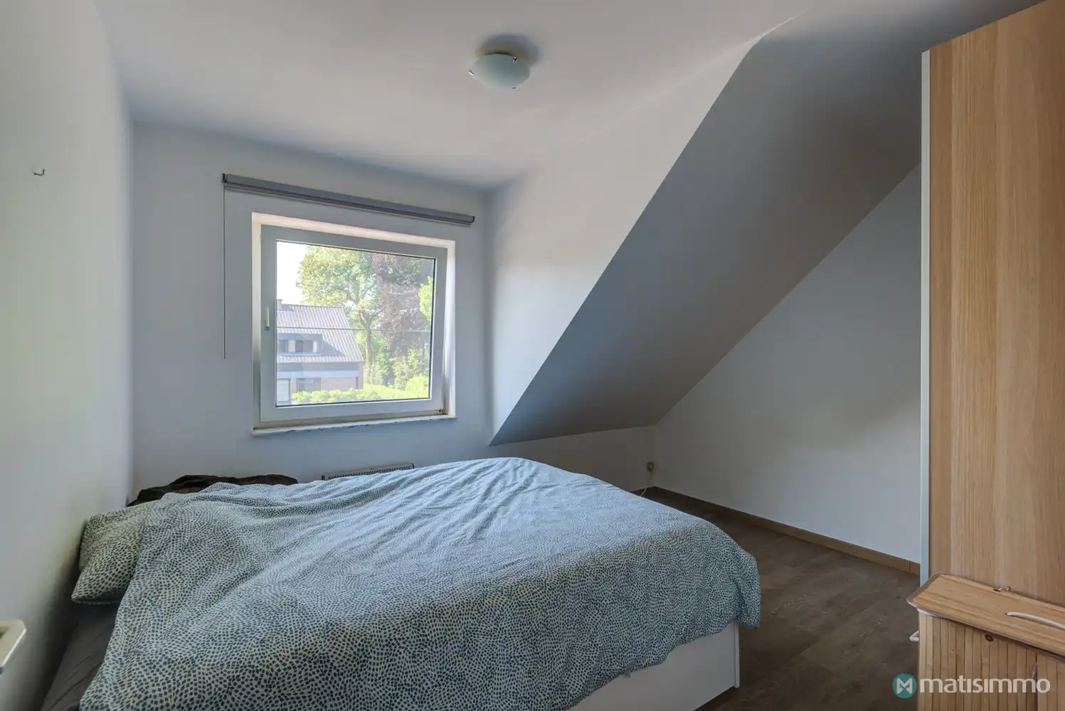 GUNSTIG GELEGEN APPARTEMENT MET 2 SLAAPKAMERS, GARAGE EN AUTOSTAANPLAATS TE BILZEN foto 8