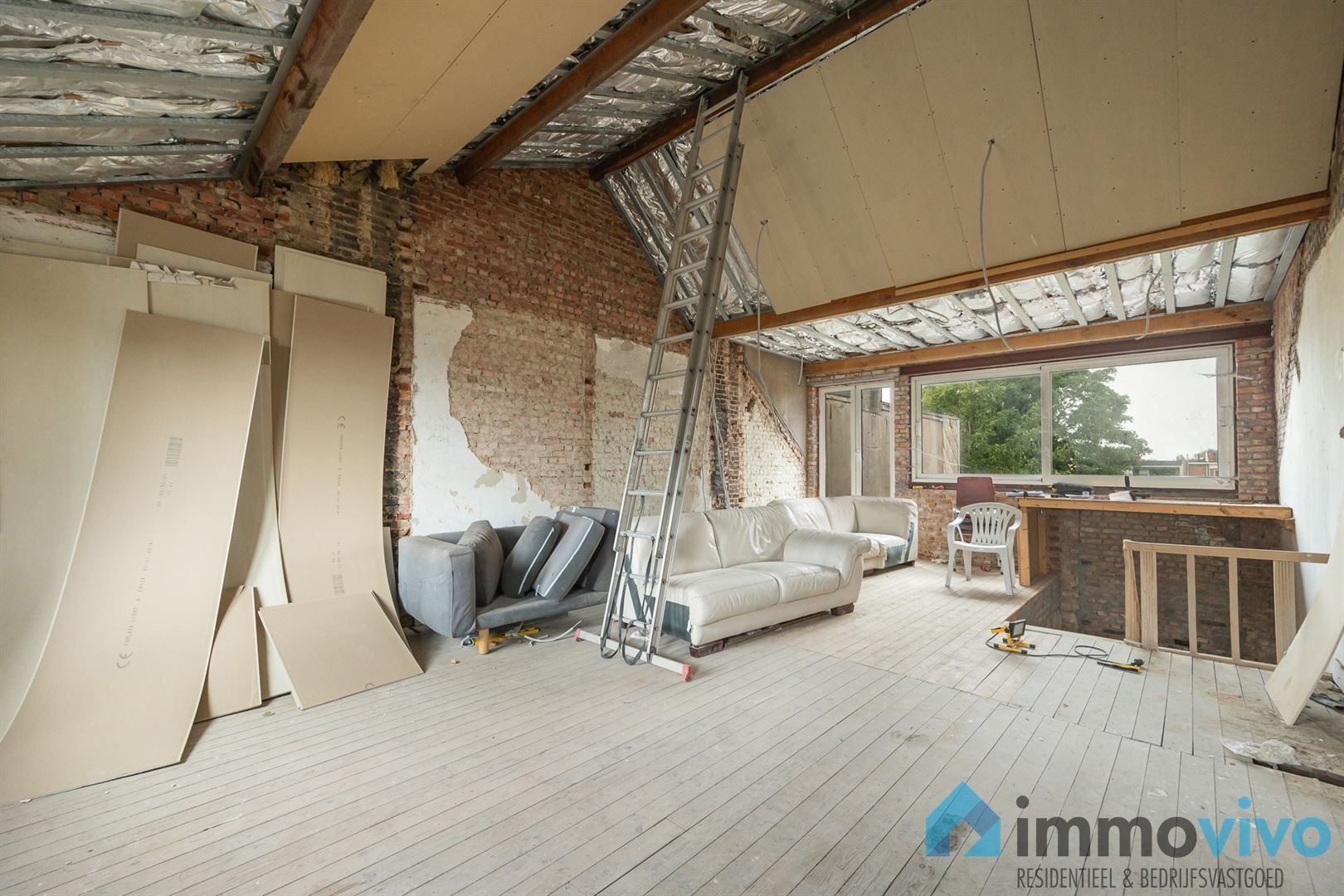 Charmant herenhuis met tuin in verder af te werken toestand foto 13