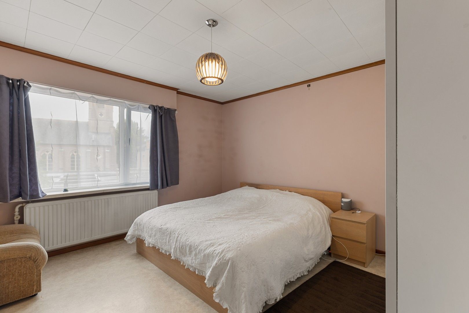 Halfopen gezinswoning in het hart van het landelijke Gontrode, met zicht op agrarisch gebied foto 14