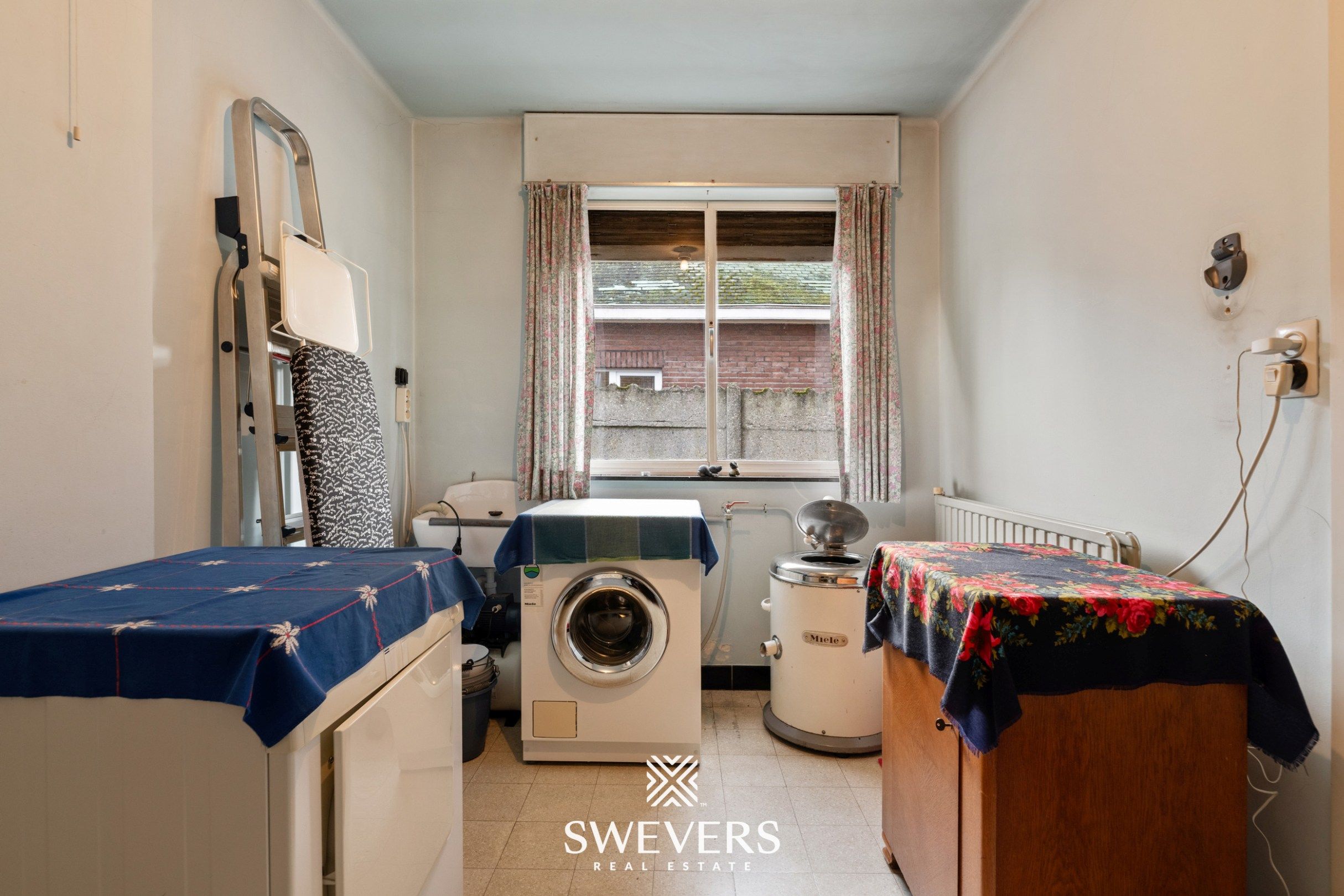 Woning met uitzonderlijk renovatiepotentieel op ruim en groen perceel nabij Zonhoven centrum foto 14