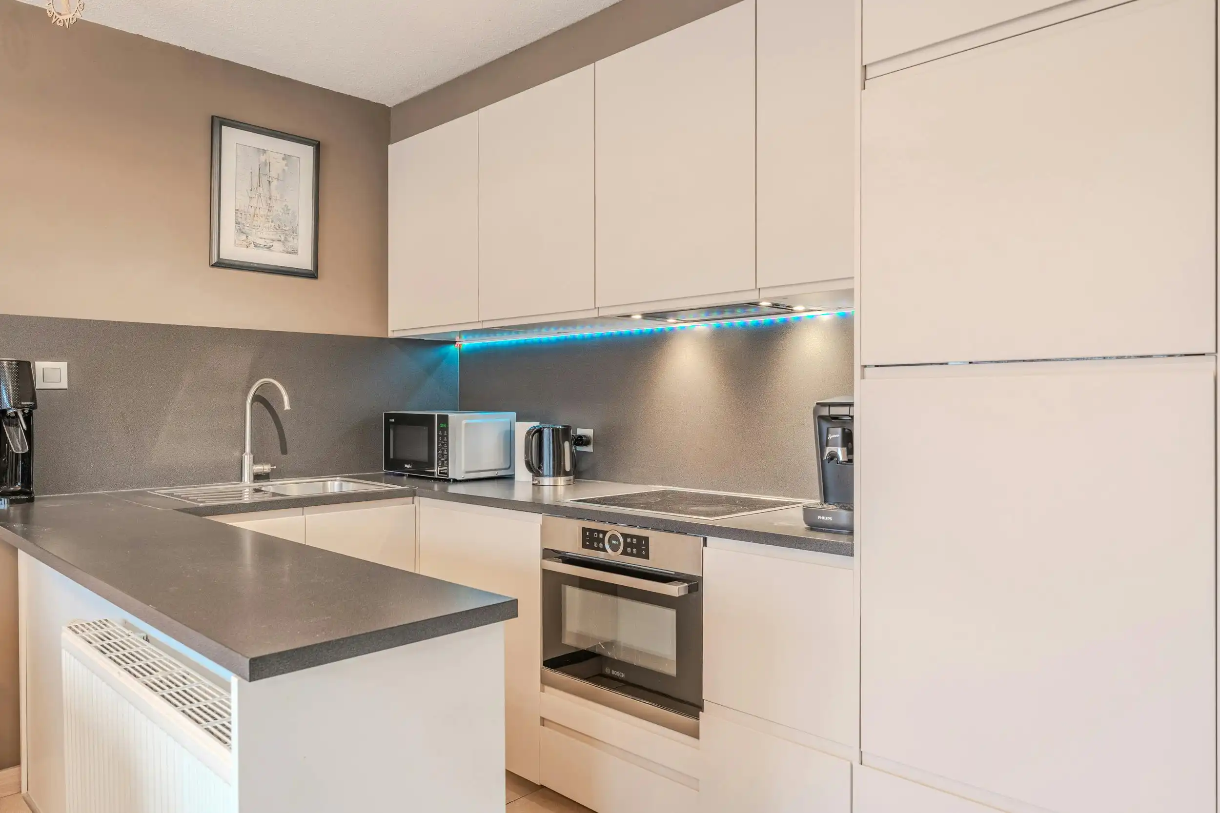 Instapklare rijwoning met zonnige tuin te Oostende foto 5