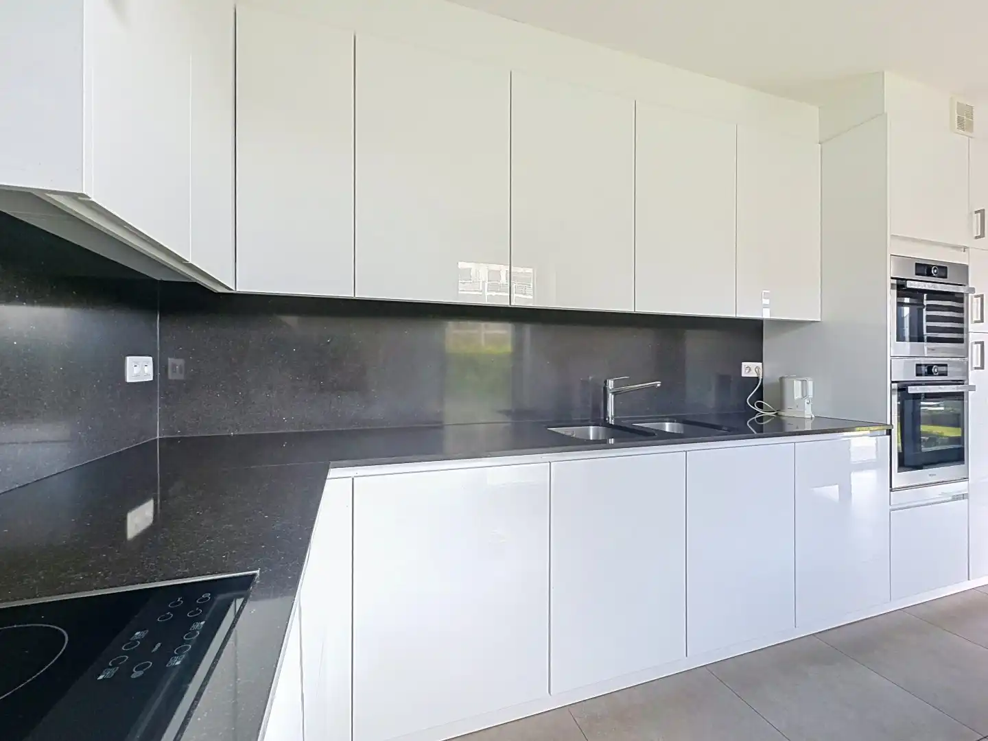 Lichtrijk gelijkvloers appartement met twee tuinen in Kessel-Lo! foto 7