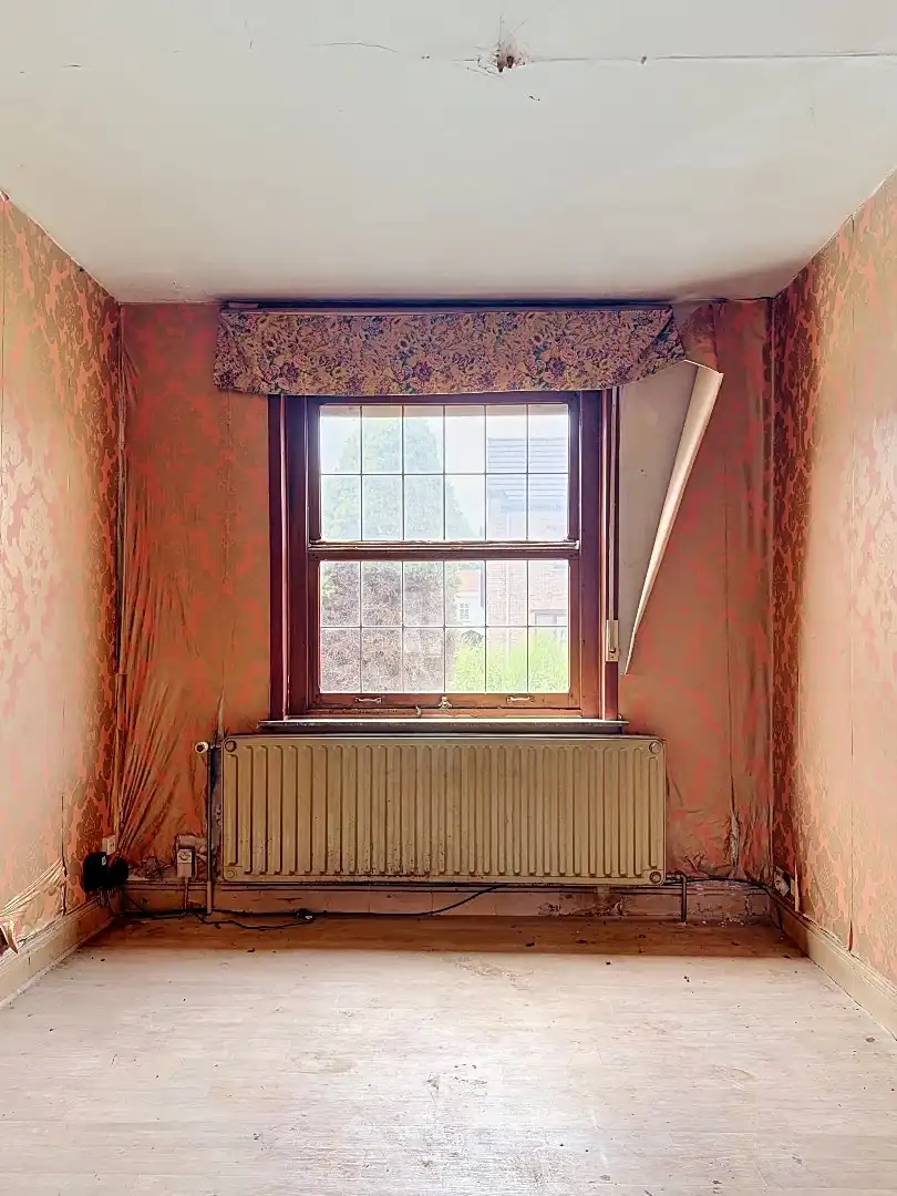 Te renoveren gezinswoning met ruime tuin in Tienen foto 4