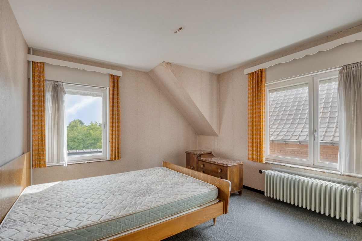 Ruime woning met tuin en 6 slaapkamers foto 16