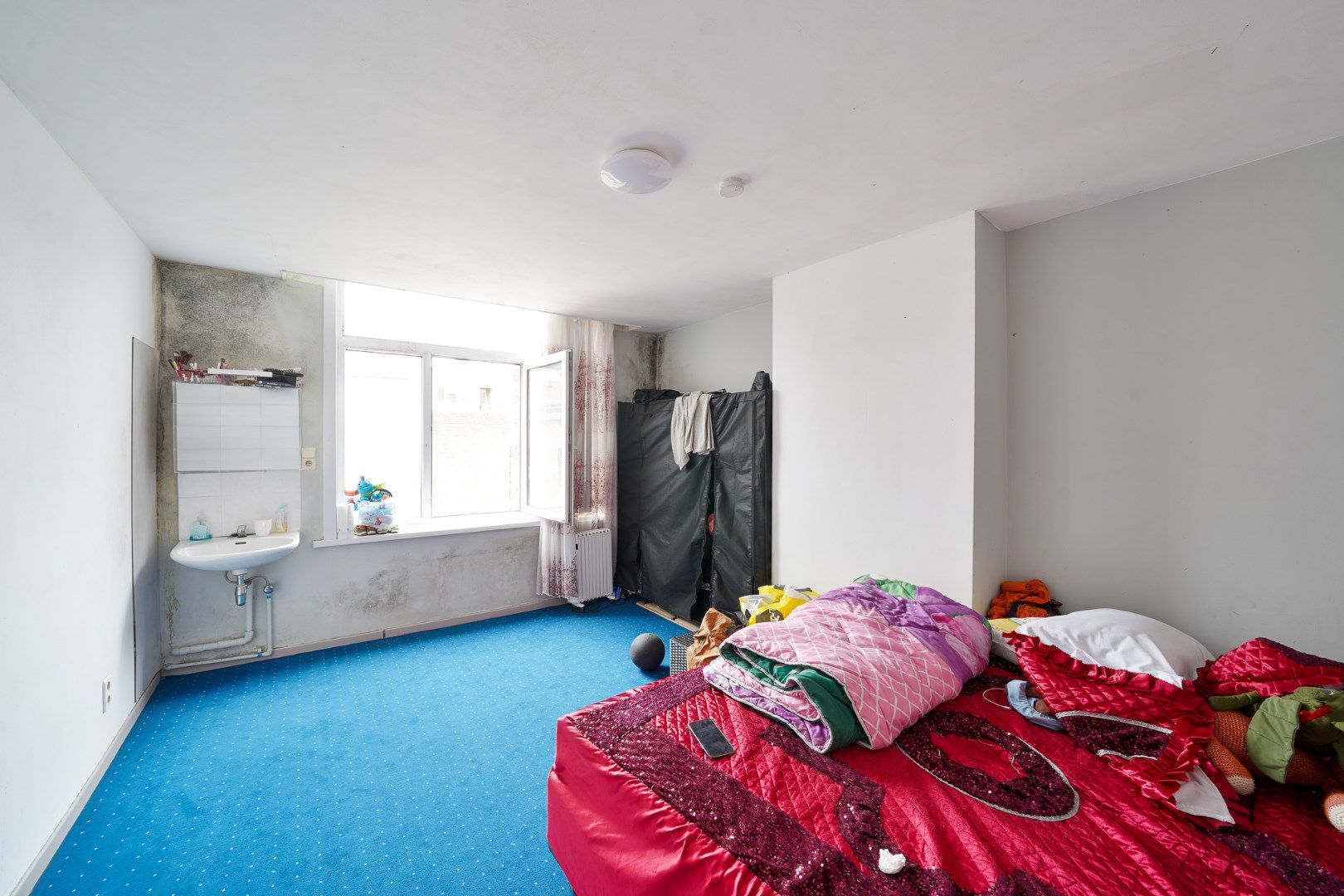 Te renoveren opbrengsteigendom met 4 vergunde appartementen in centrum Oostende foto 6
