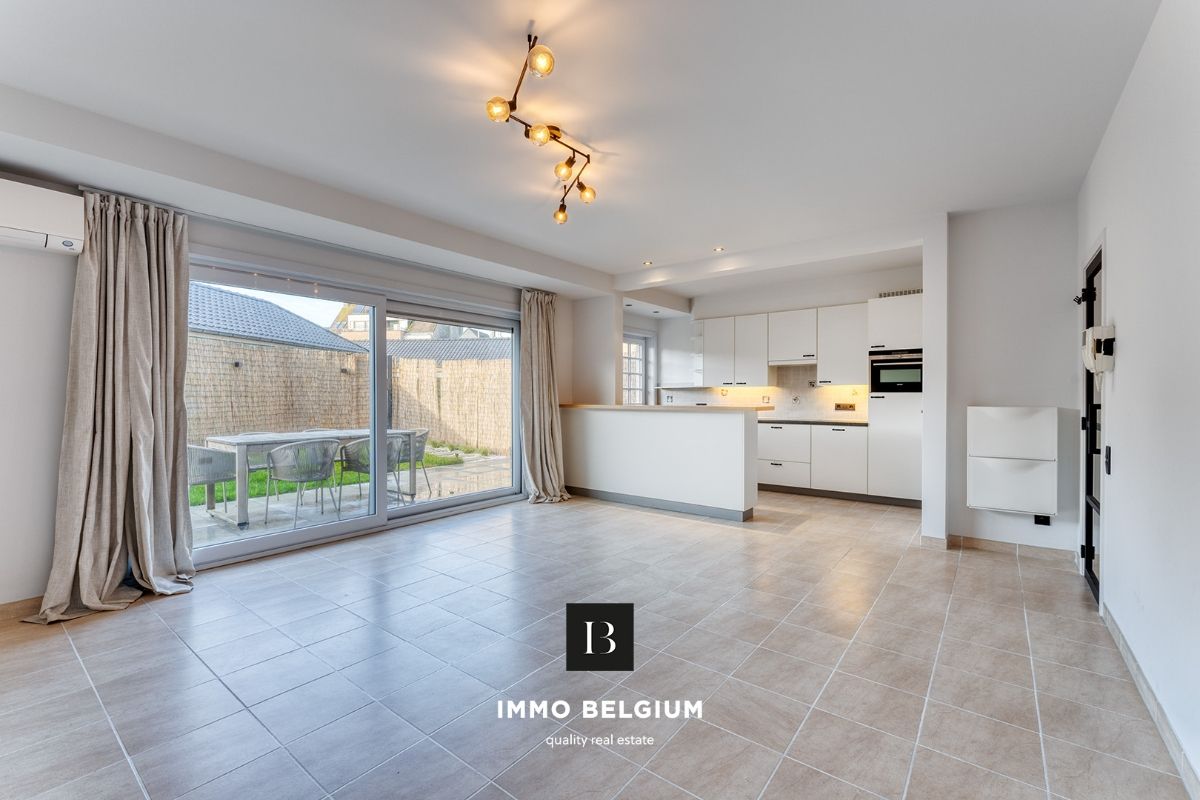 Mooi gerenoveerd appartement met tuintje nabij het centrum foto 4