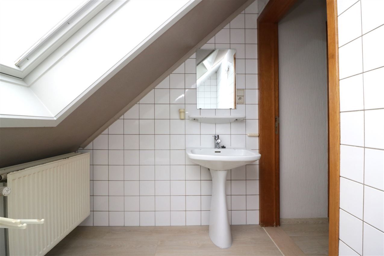 Centraal gelegen appartement met 3 slpk., garage en terras foto 25