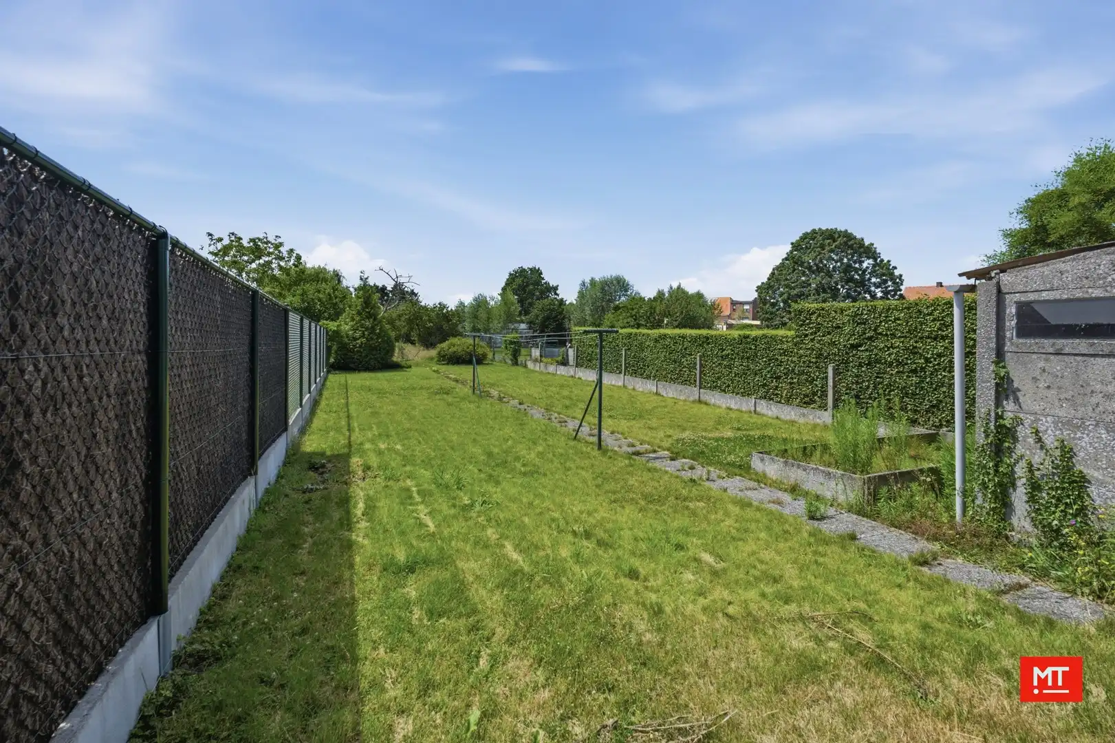 Kloeke te renoveren woning met 4 slaapkamers, grote tuin en garage in het centrum van Langemark foto 24