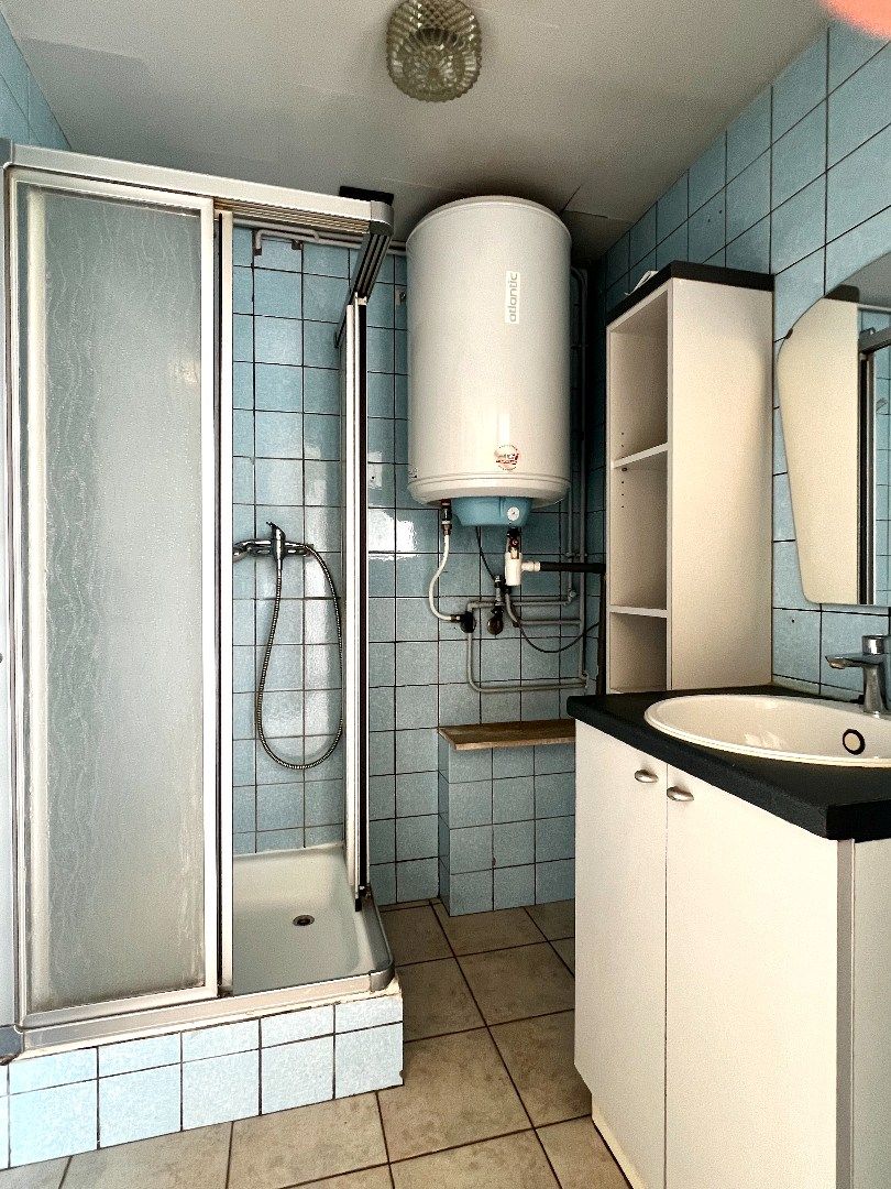 Charmante gezinswoning in hartje Harelbeke – een ideale starterswoning of slimme investering! foto 12