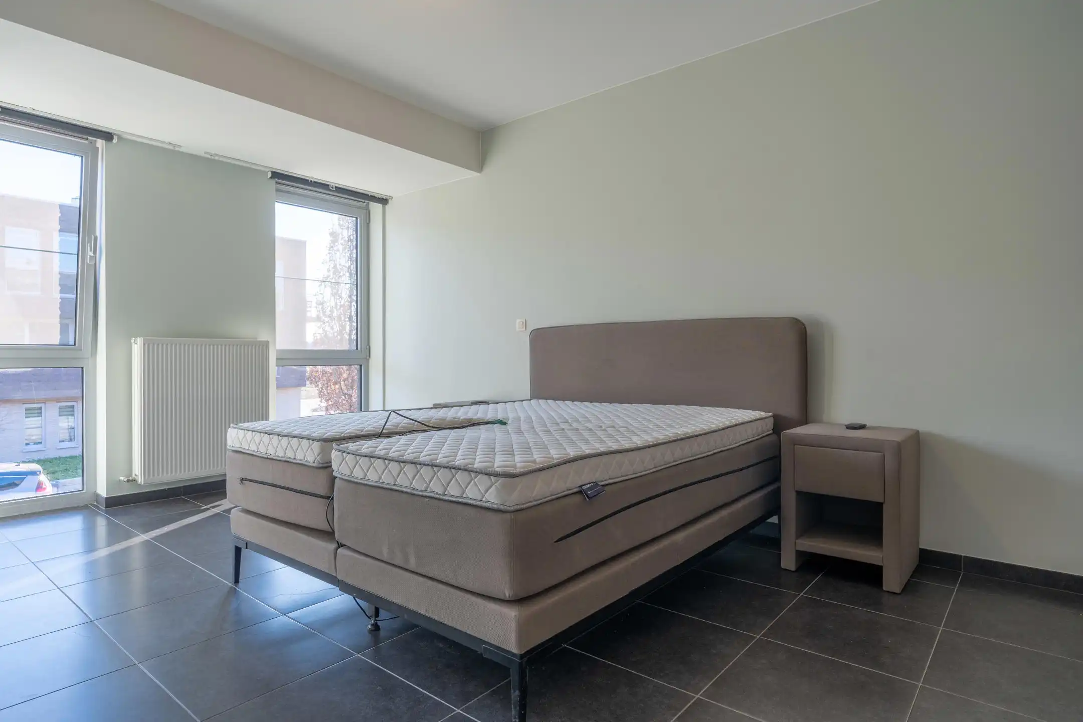 Instapklaar 2-slaapkamer appartement met terras en garagebox foto 14