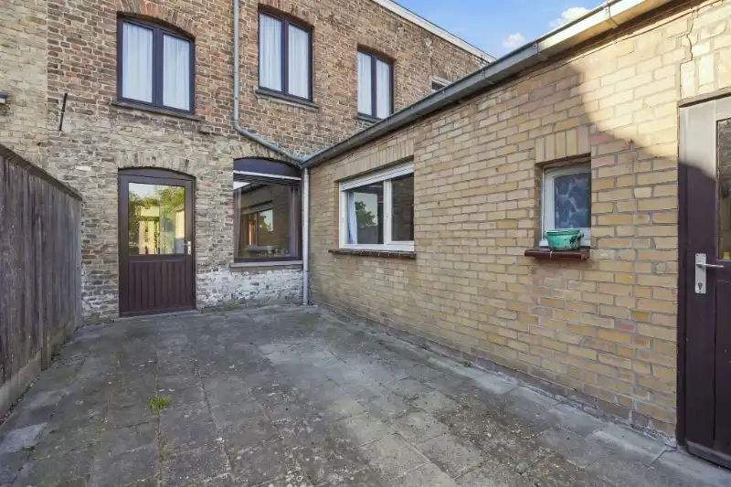 Rijwoning met tuin foto 20