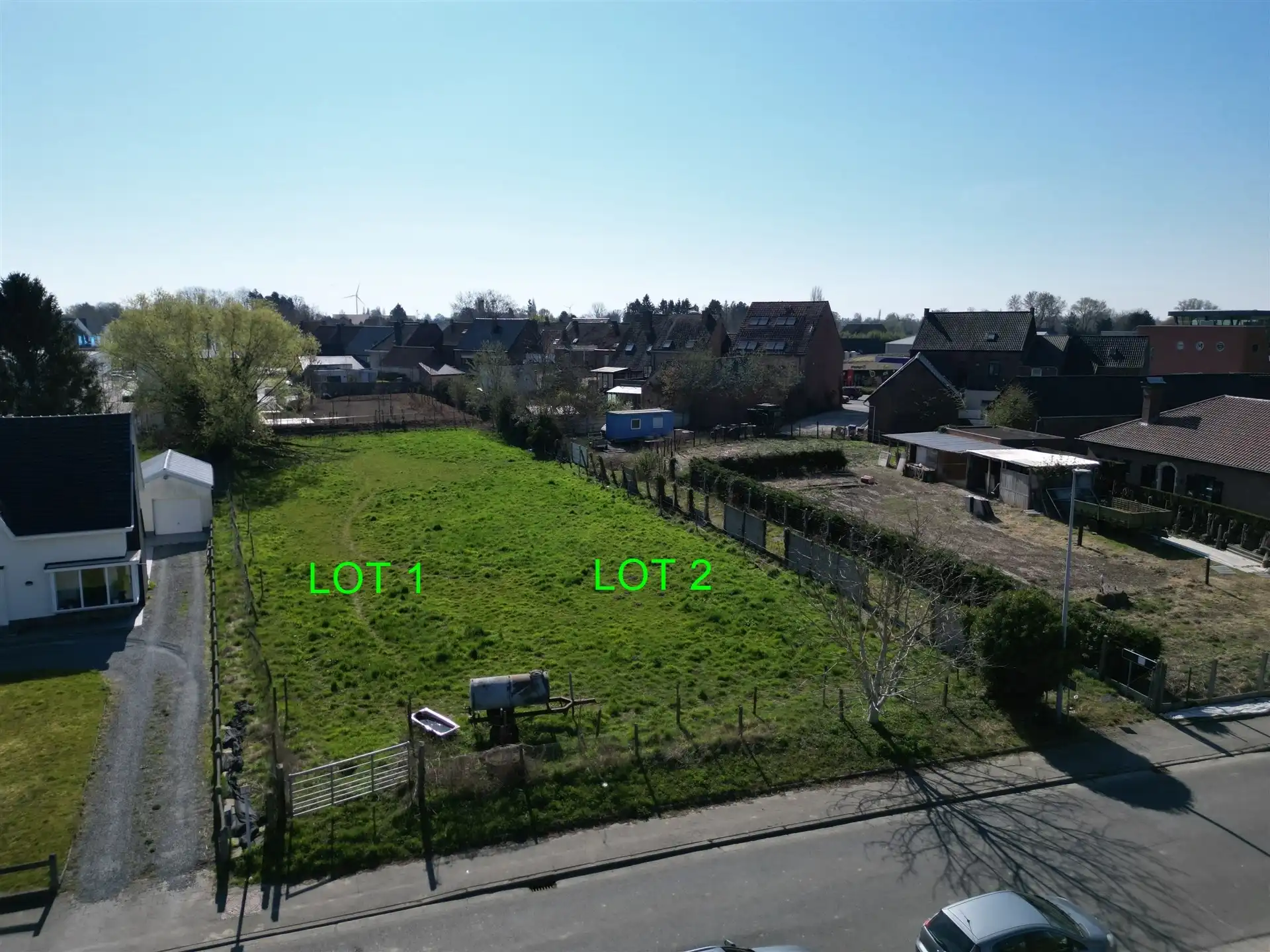Bouwgrond voor halfopen bebouwing (lot 1) - 935m² foto {{pictureIndex}}