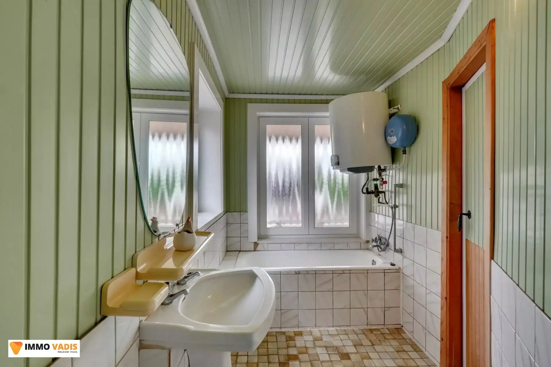 Charmante woning met 2 slaapkamers, garage én magazijn foto 16