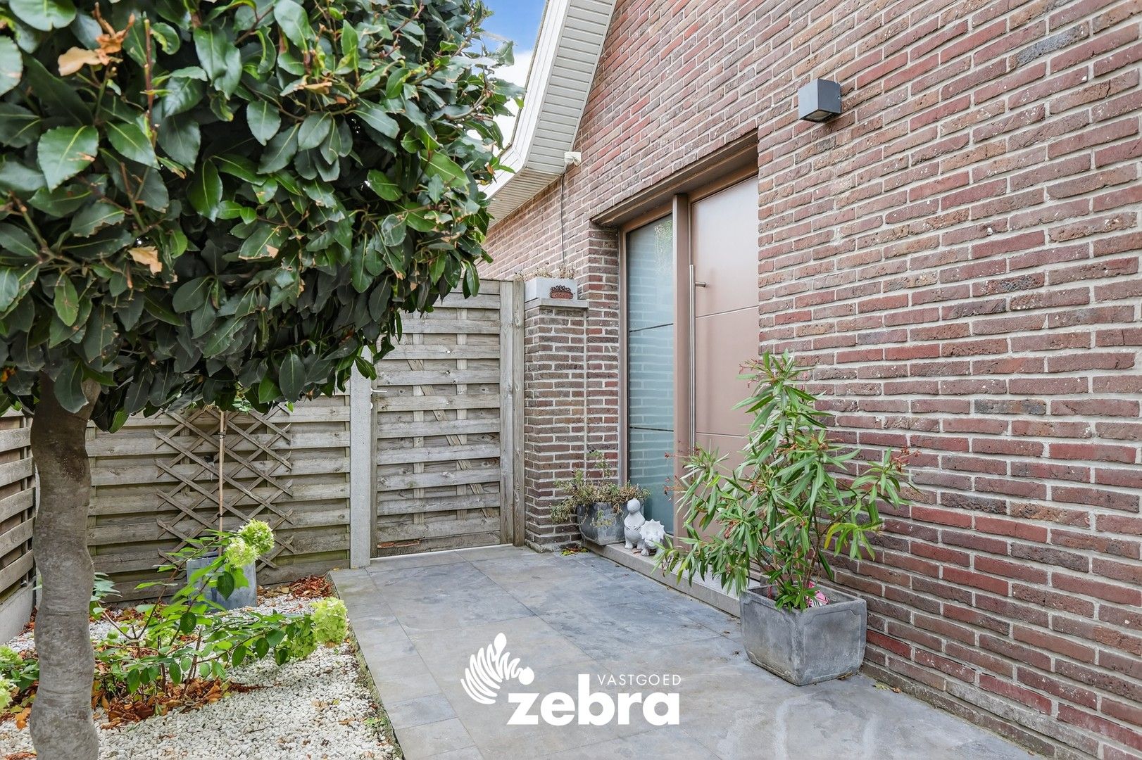 Instapklare ruime HOB met drie slaapkamers en prachtige tuin te Tielt! foto 3