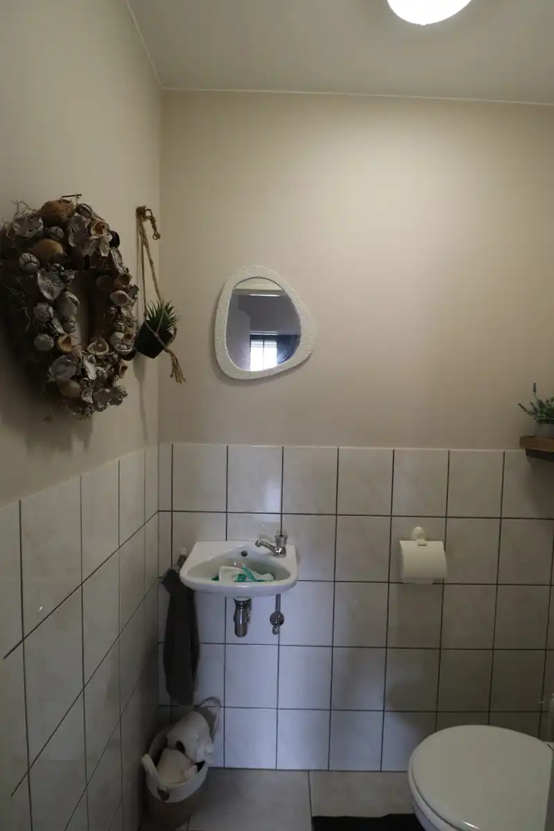 Een appartement op de benedenverdieping met tuin en garage. foto 9