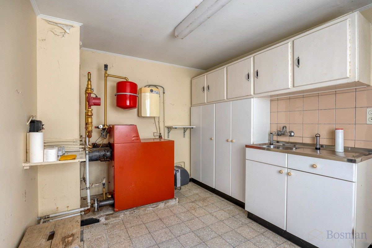 Halfopen bebouwing met 5 garageboxen te koop in Ham foto 25