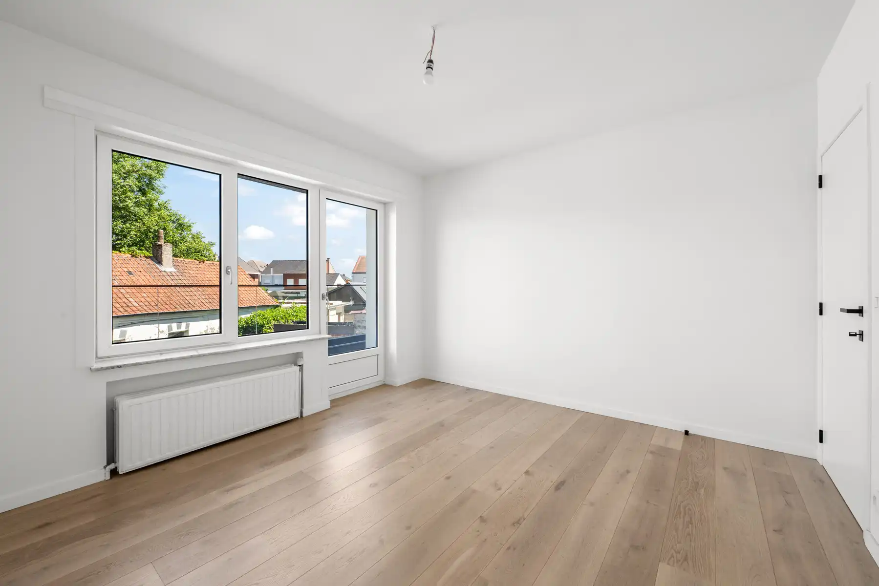 Gerenoveerd 2 slaapkamerappartement met garage foto 14