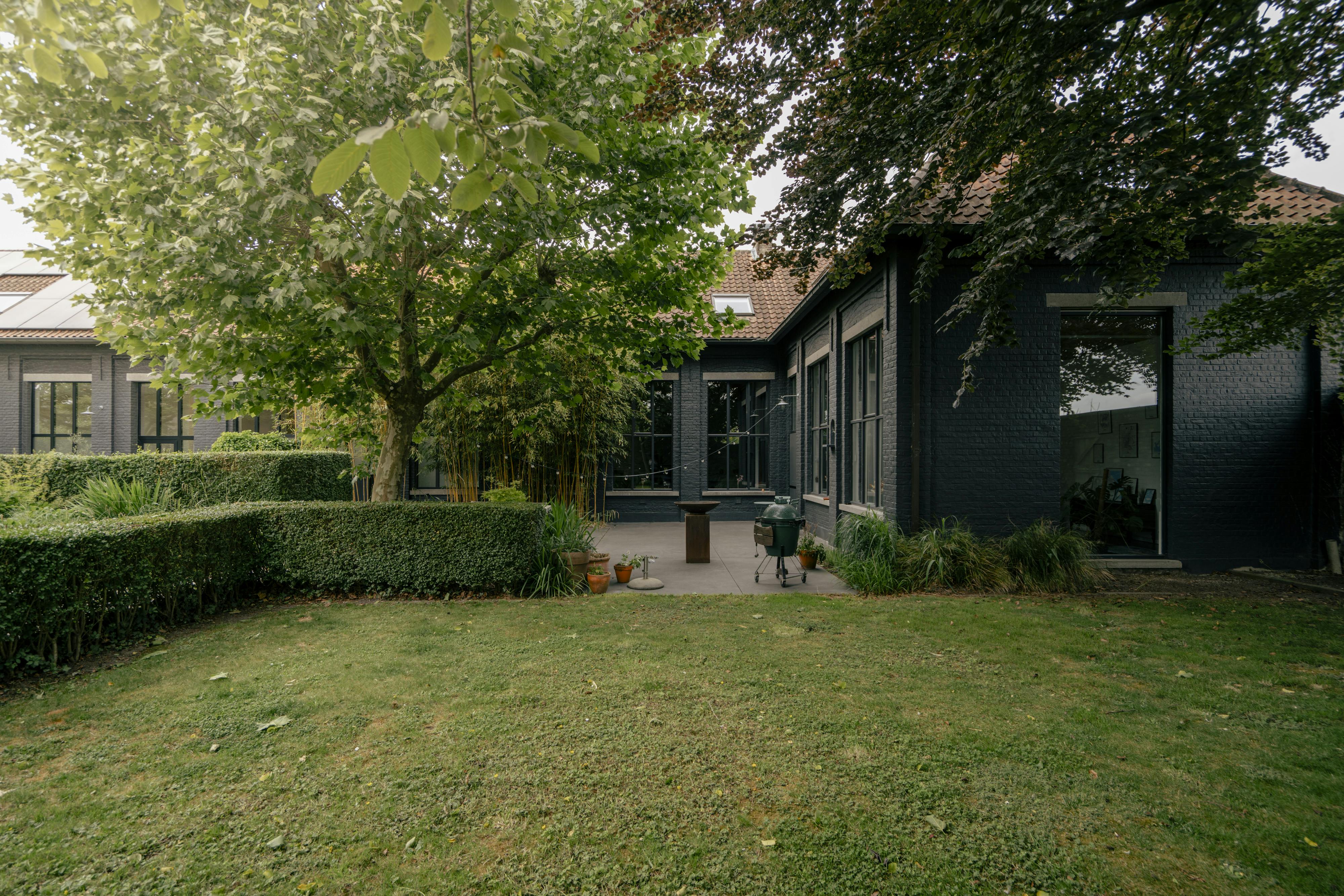 Exclusieve karaktervilla met praktijkruimte en loft in Wetteren foto 21