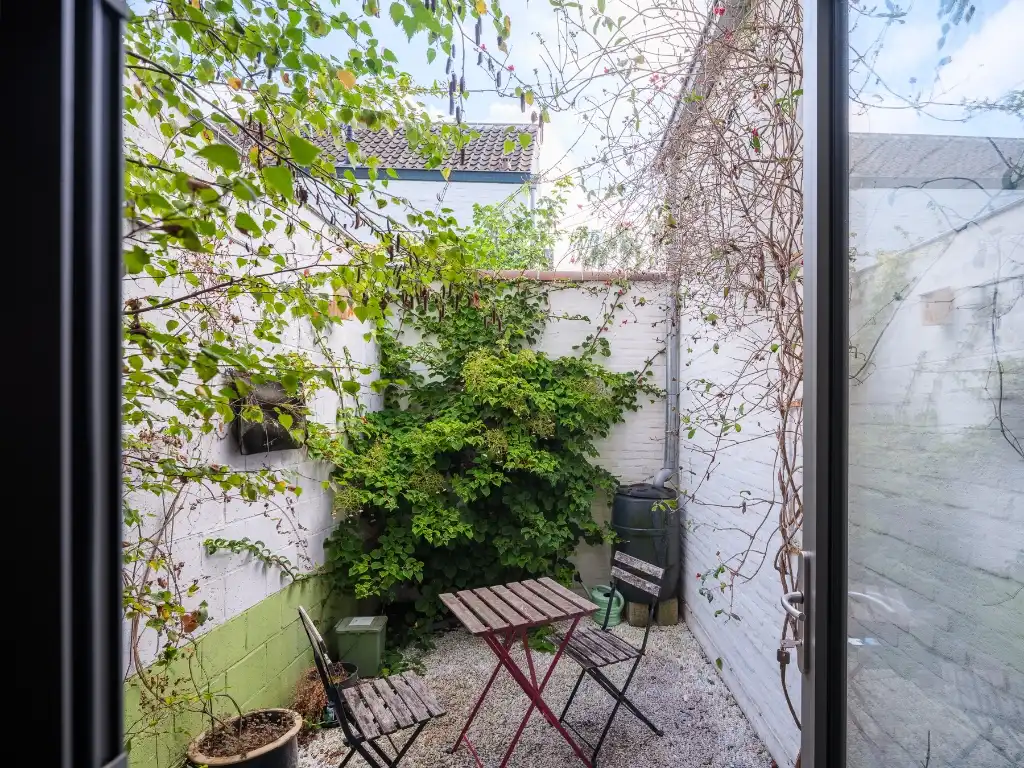 Instapklare stadswoning met tuin en dakterras nabij de Coupure foto 6