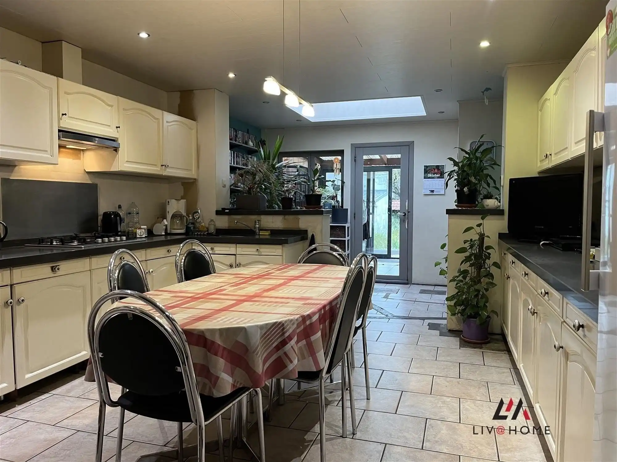 2 aangrenzende rijwoningen met gemeenschappelijke tuin foto 12