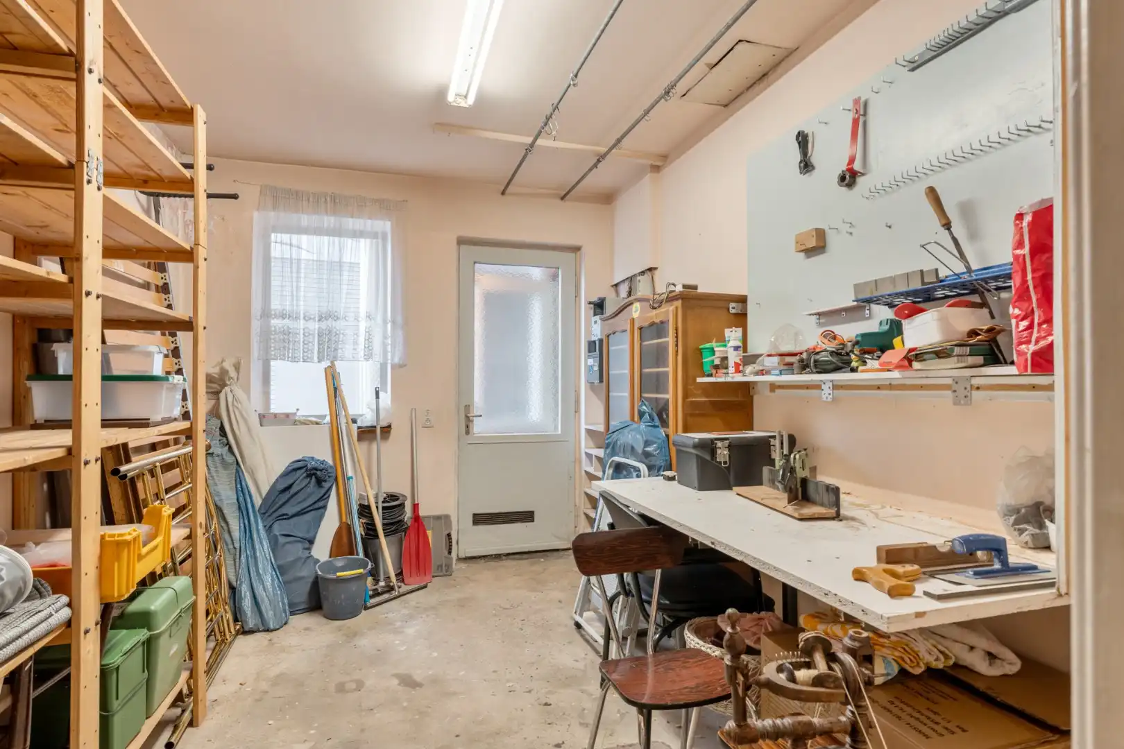 Centraal gelegen gebouw bestaande uit een handelspand op het gelijkvloers en een bovenliggend duplex-appartement! foto 28