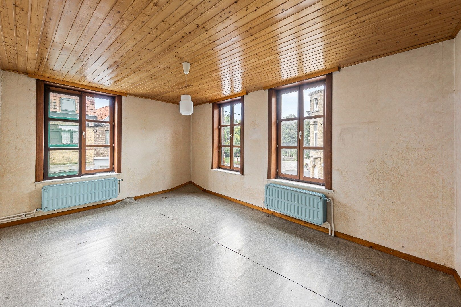 Gezellige stadswoning met 4 slaapkamers, ruime garage en koertje. foto 4