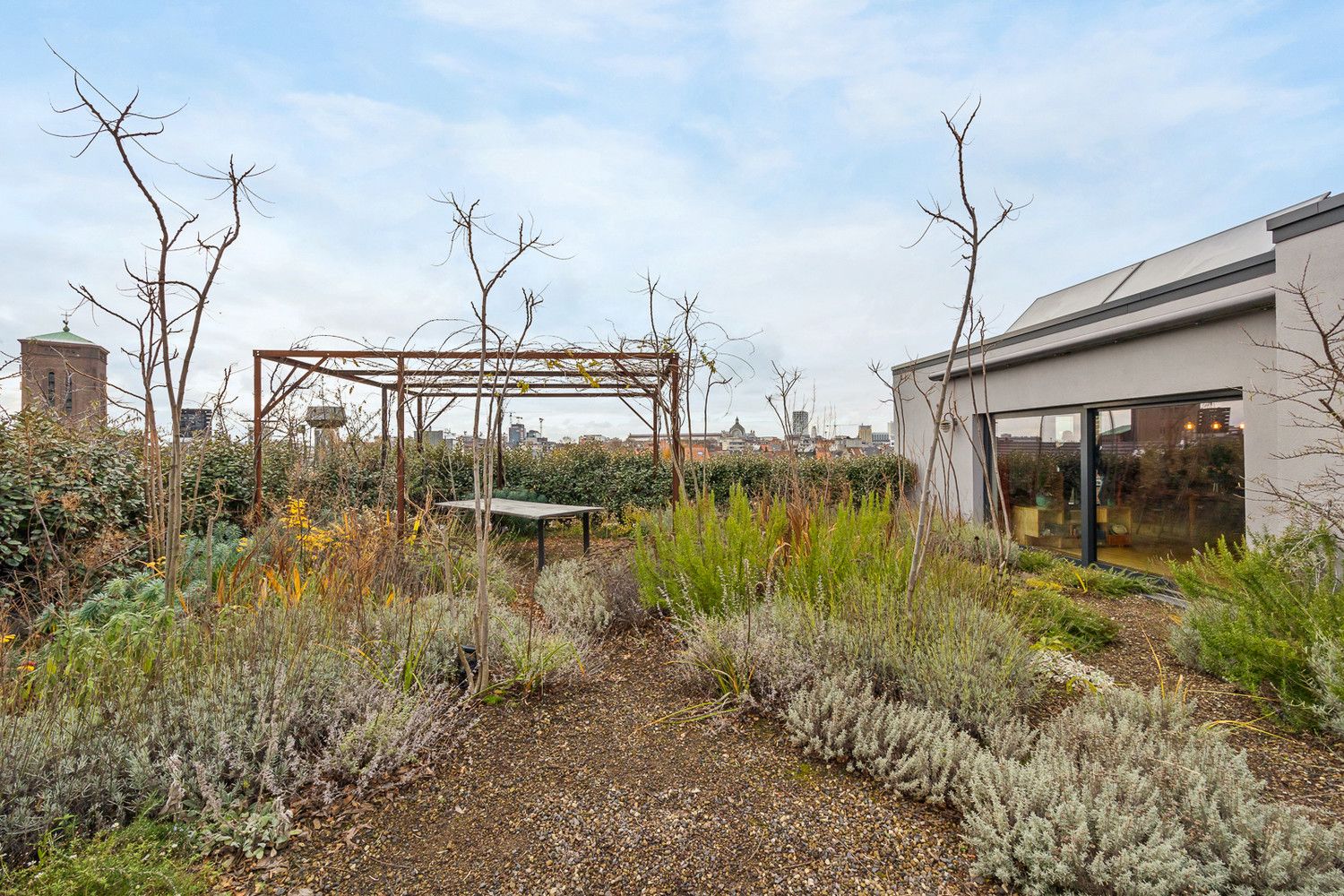 Uitzonderlijke loft 200m² + aangelegde daktuin, terras en 2 optionele garages in rustig, groen woonerf op de grens Borgerhout/Antwerpen foto 30